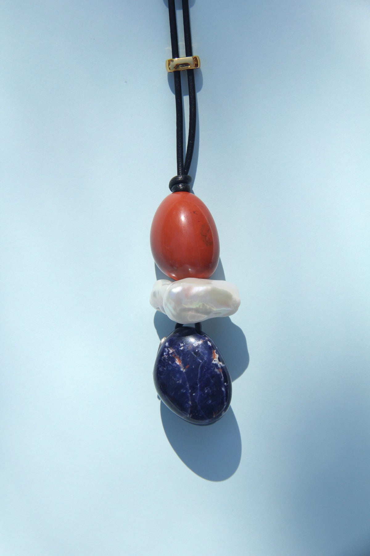 Necklace: red jasper stone, pearl, blue vein stone