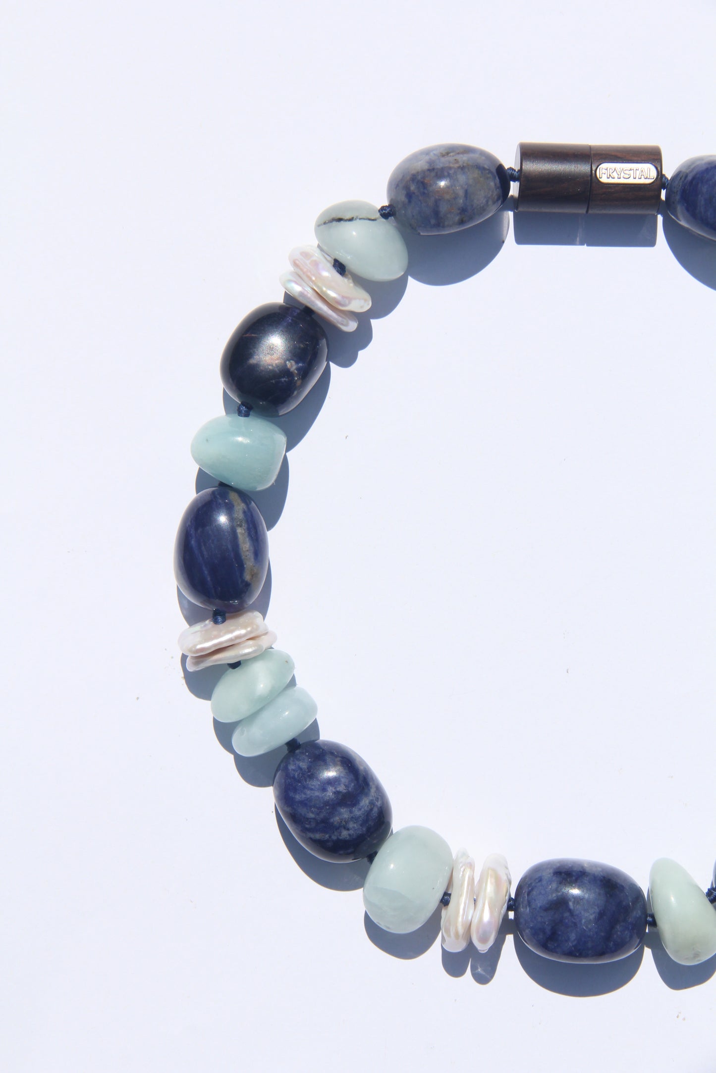 Necklace: aquamarine, blue vein stone, pearls