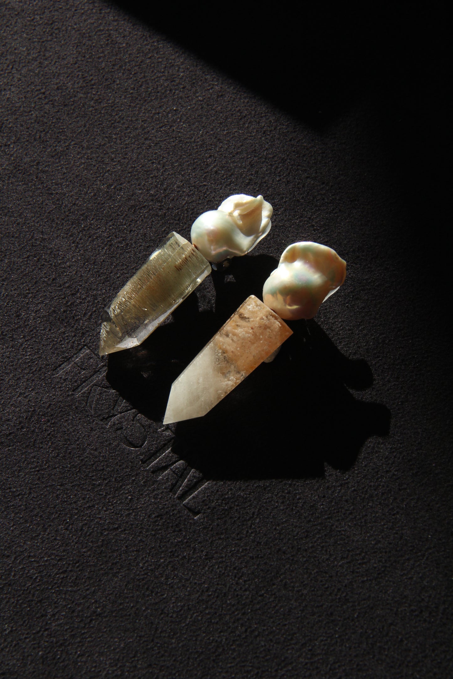 Earrings: pearls, phantom quartz