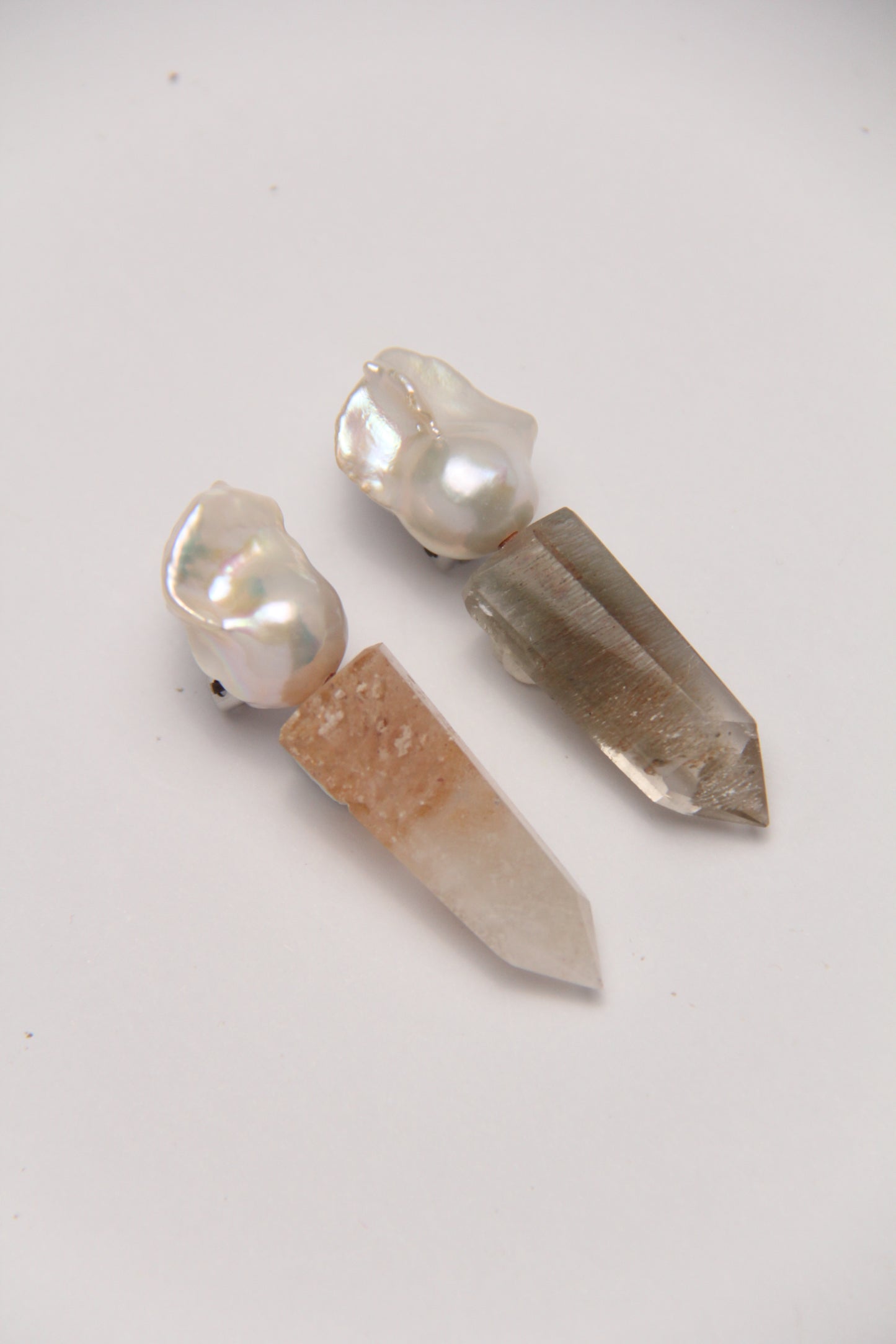 Earrings: pearls, phantom quartz