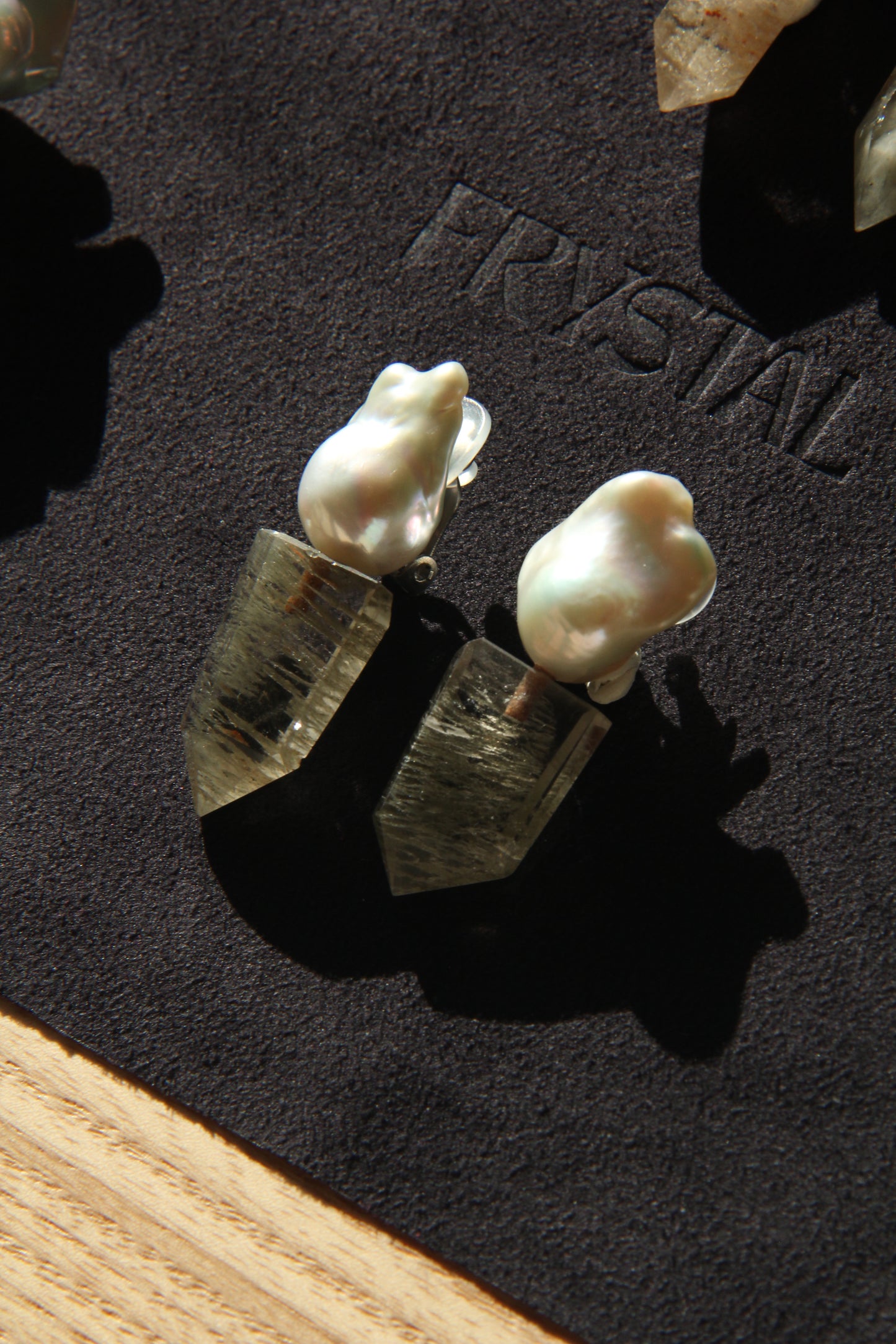 Earrings: pearls, phantom quartz