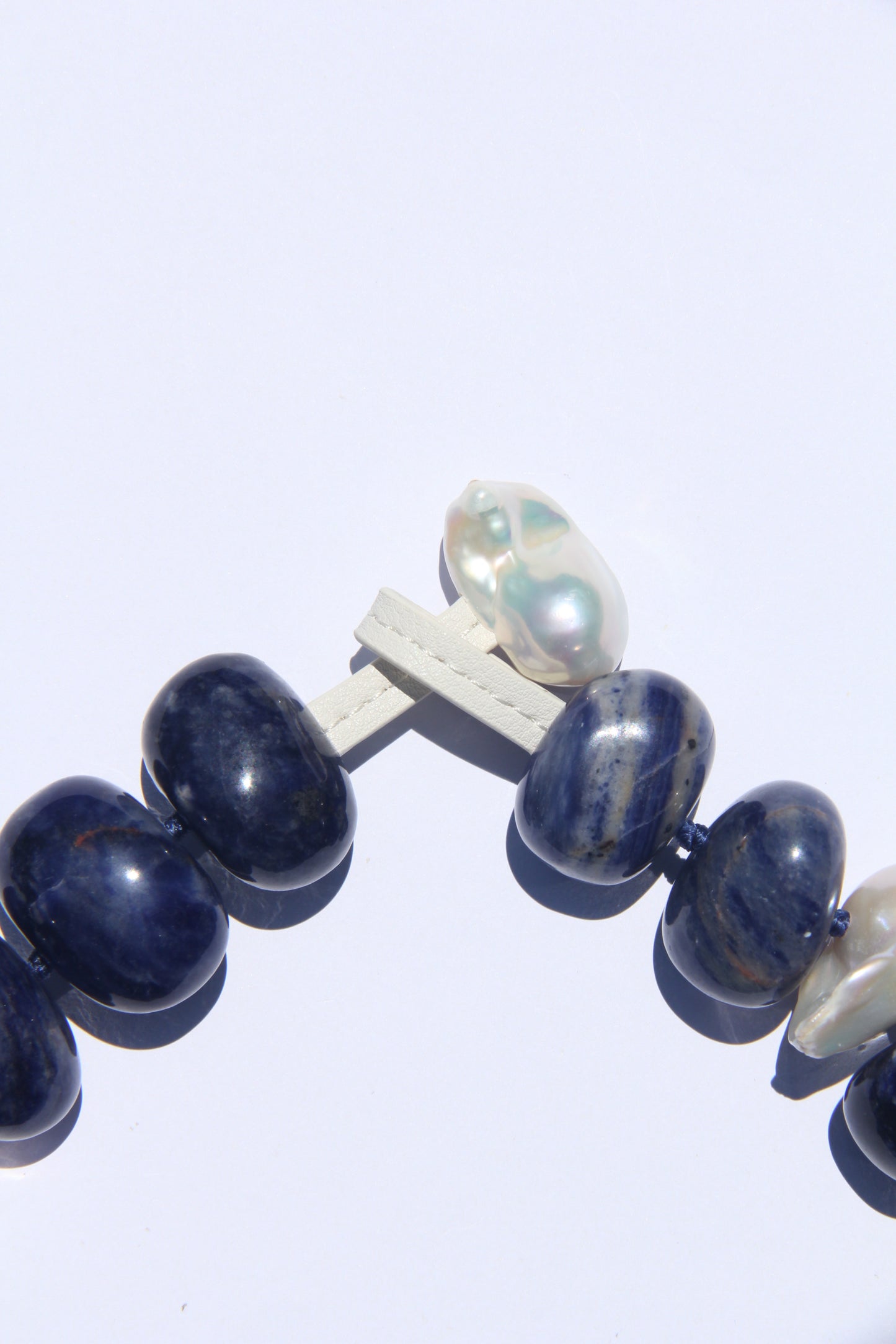 Necklace: pearls, blue vein stone