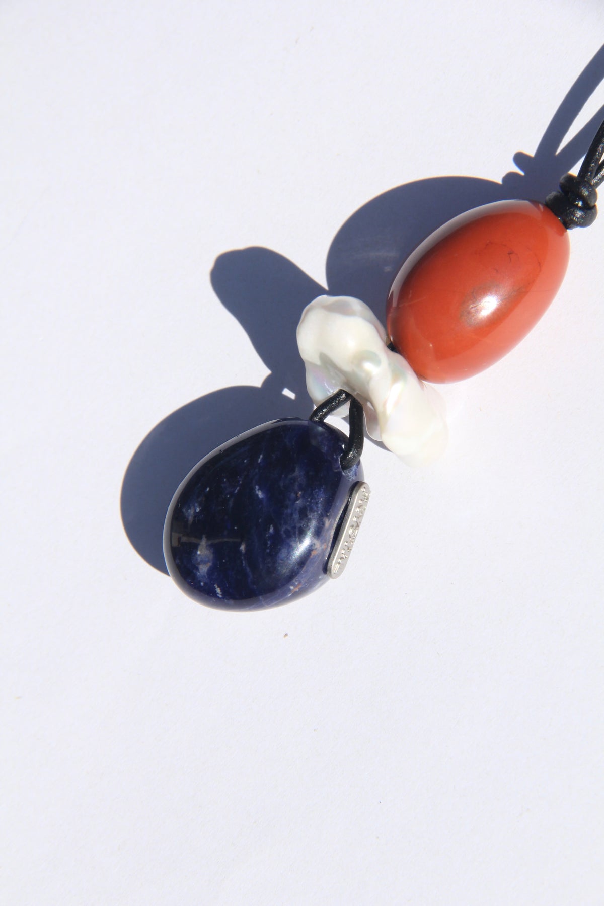 Necklace: red jasper stone, pearl, blue vein stone