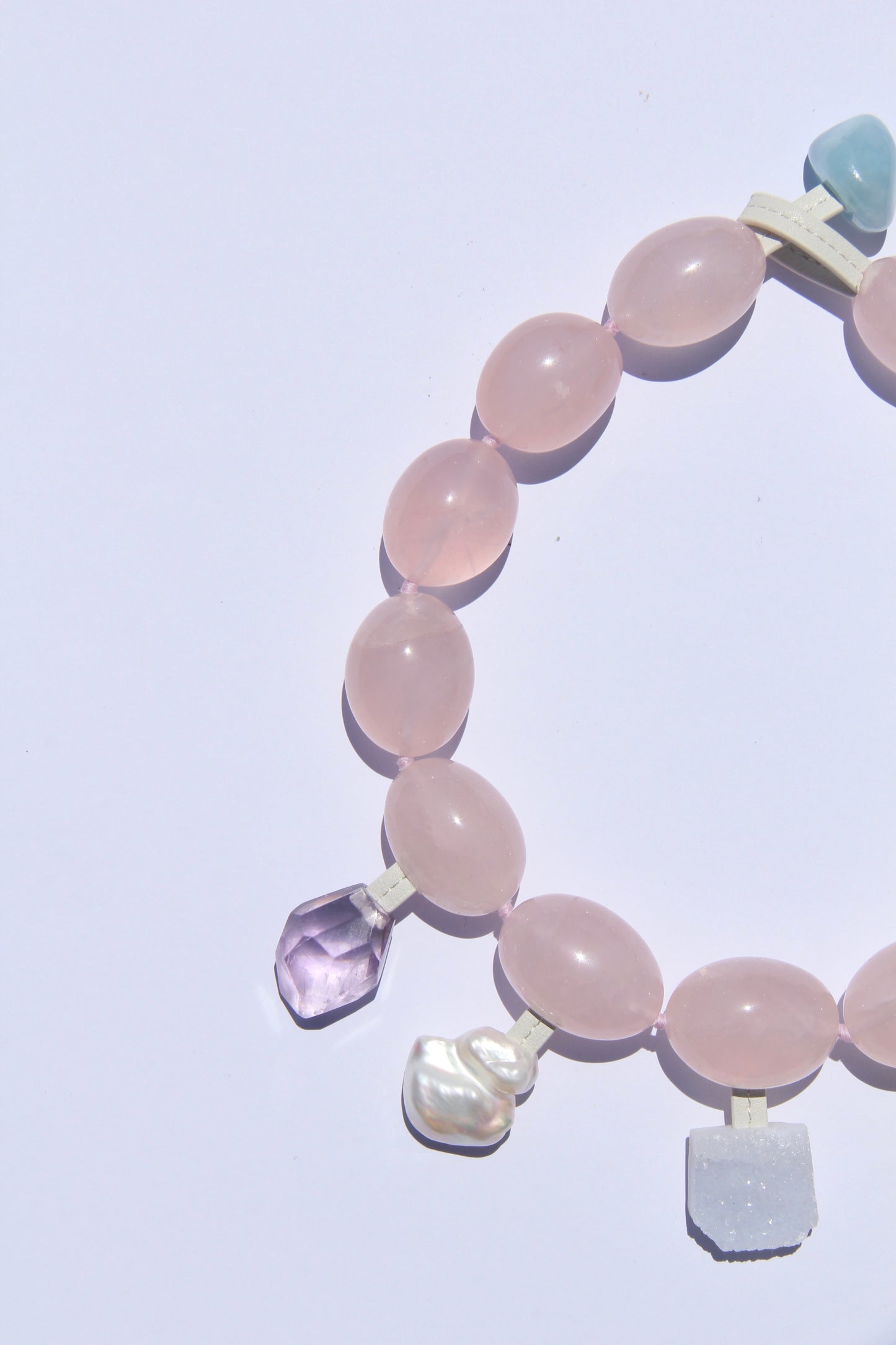 Charms: rose quartz, amethyst, morganite, pearl, blue lace agate