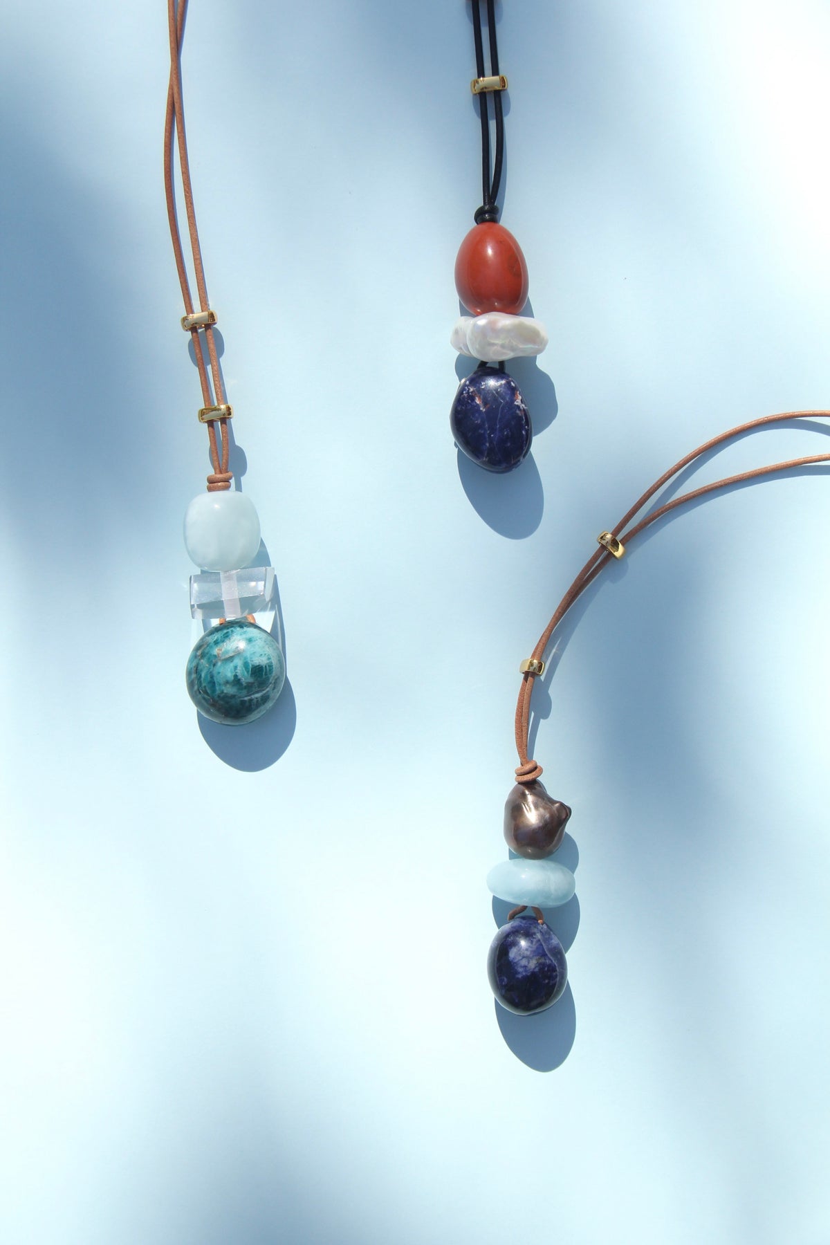 Necklace: red jasper stone, pearl, blue vein stone