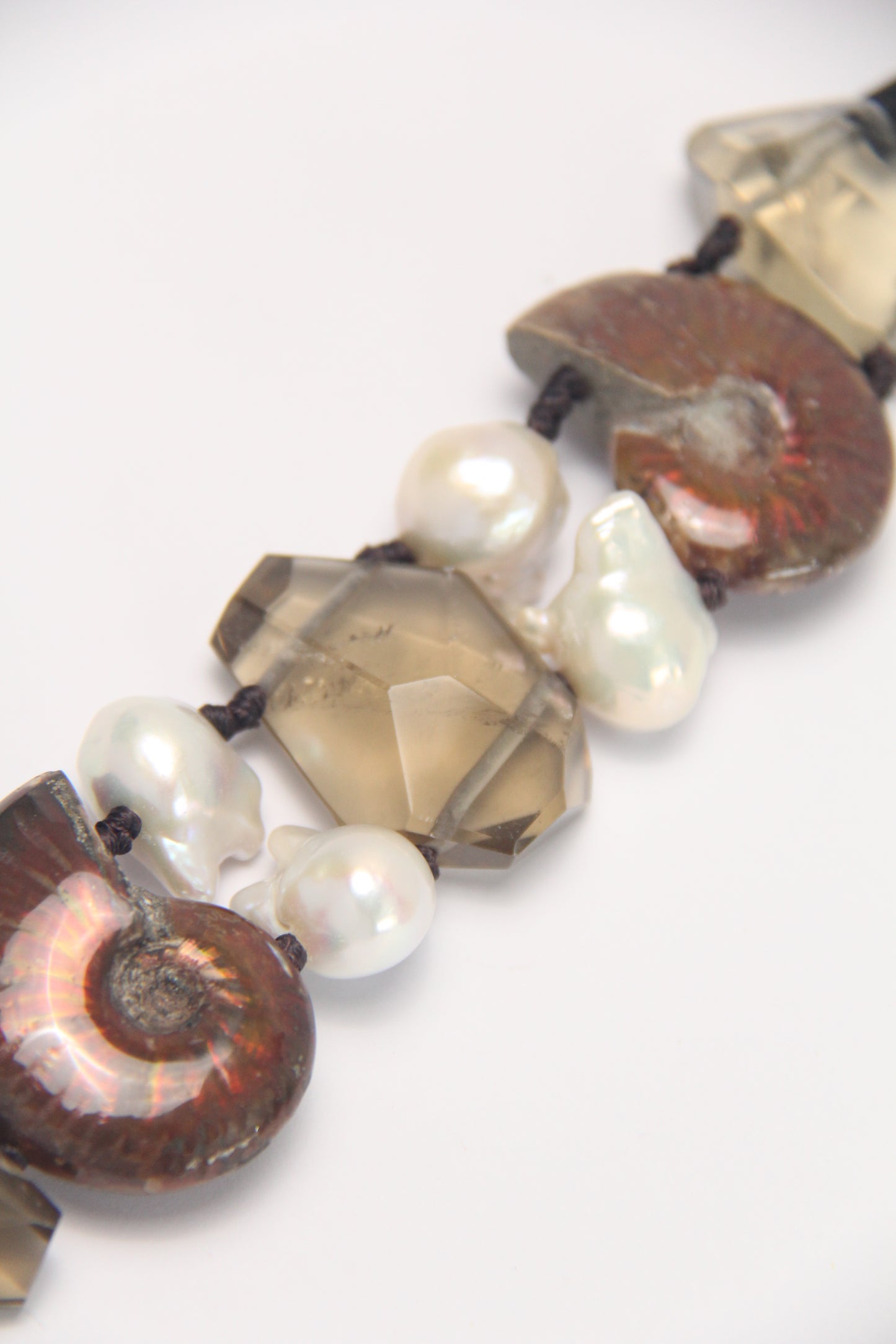 Bracelet: ammonite fossils, smoky quartz, pearls
