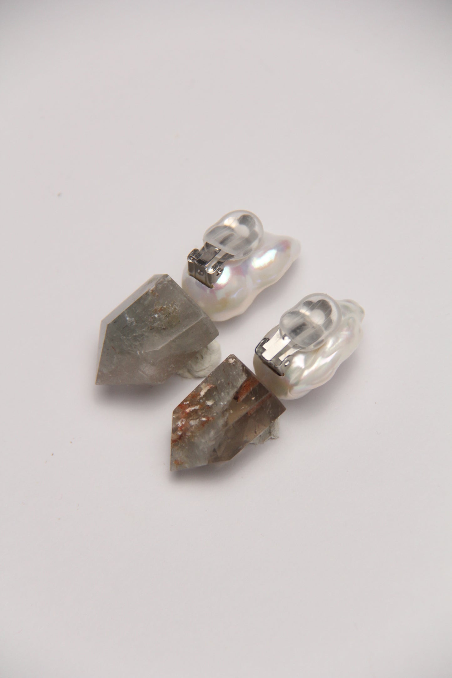 Earrings: pearls, phantom quartz