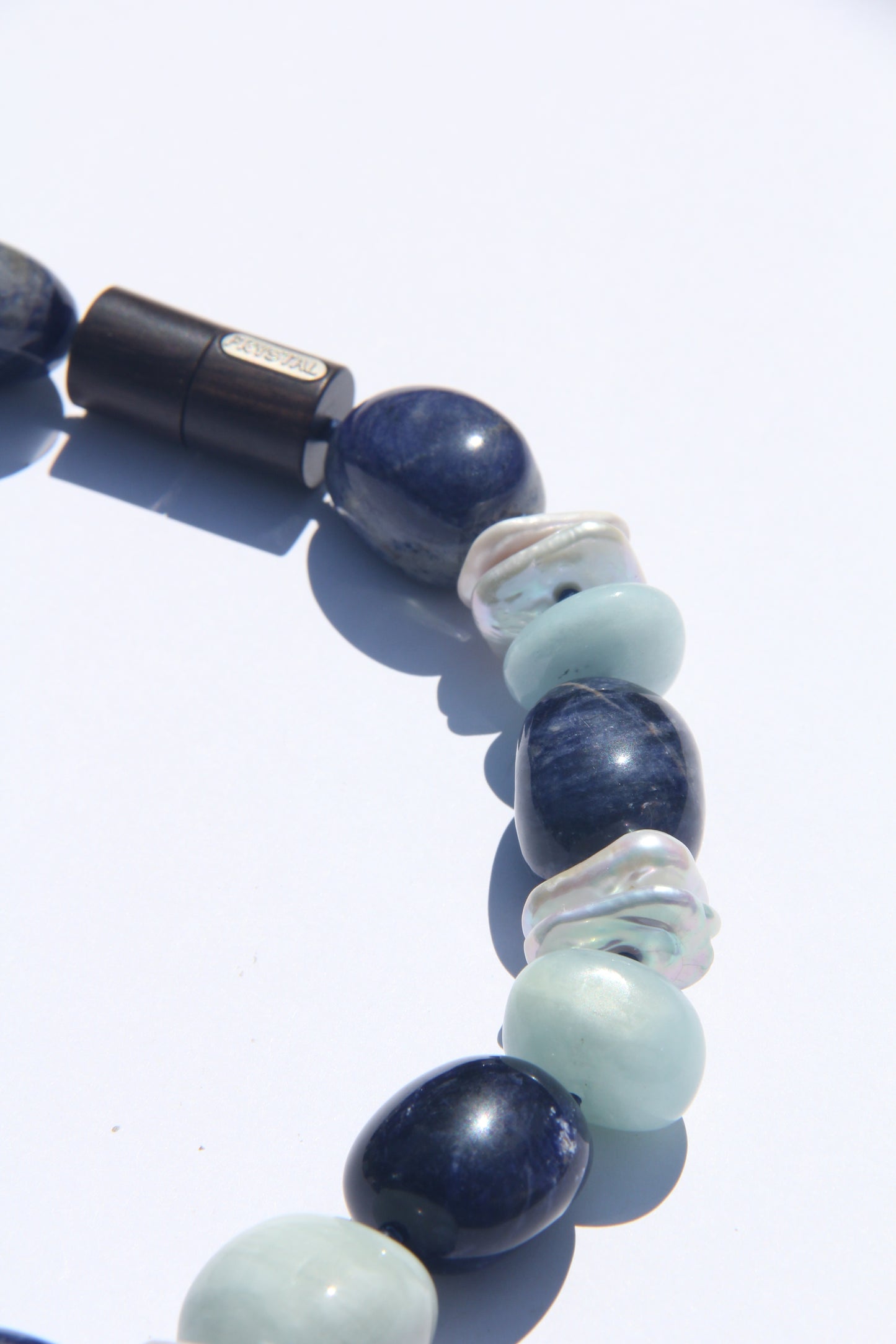Necklace: aquamarine, blue vein stone, pearls