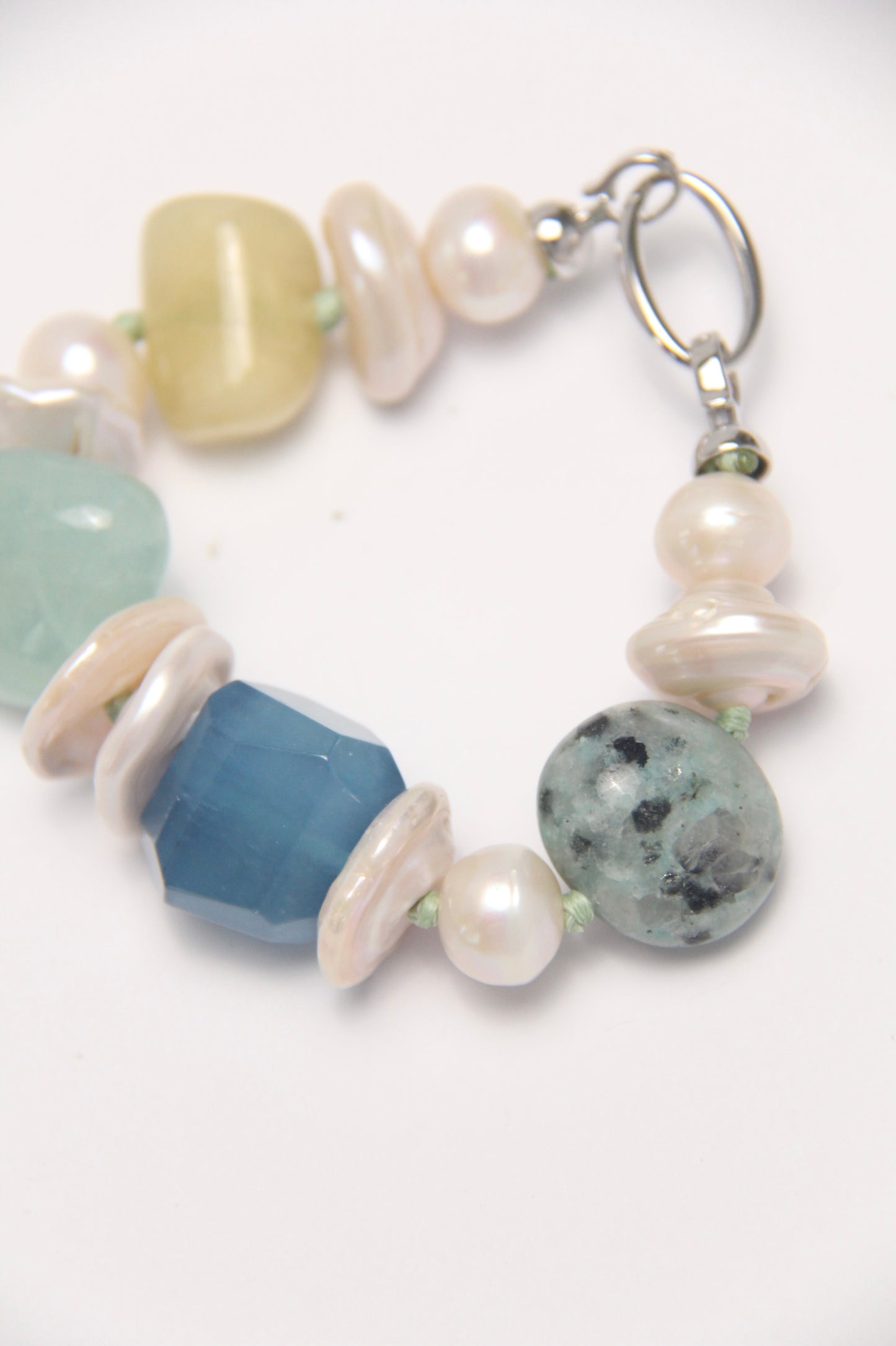 Bracelet: aquamarine, morganite, kiwi stone, pearls