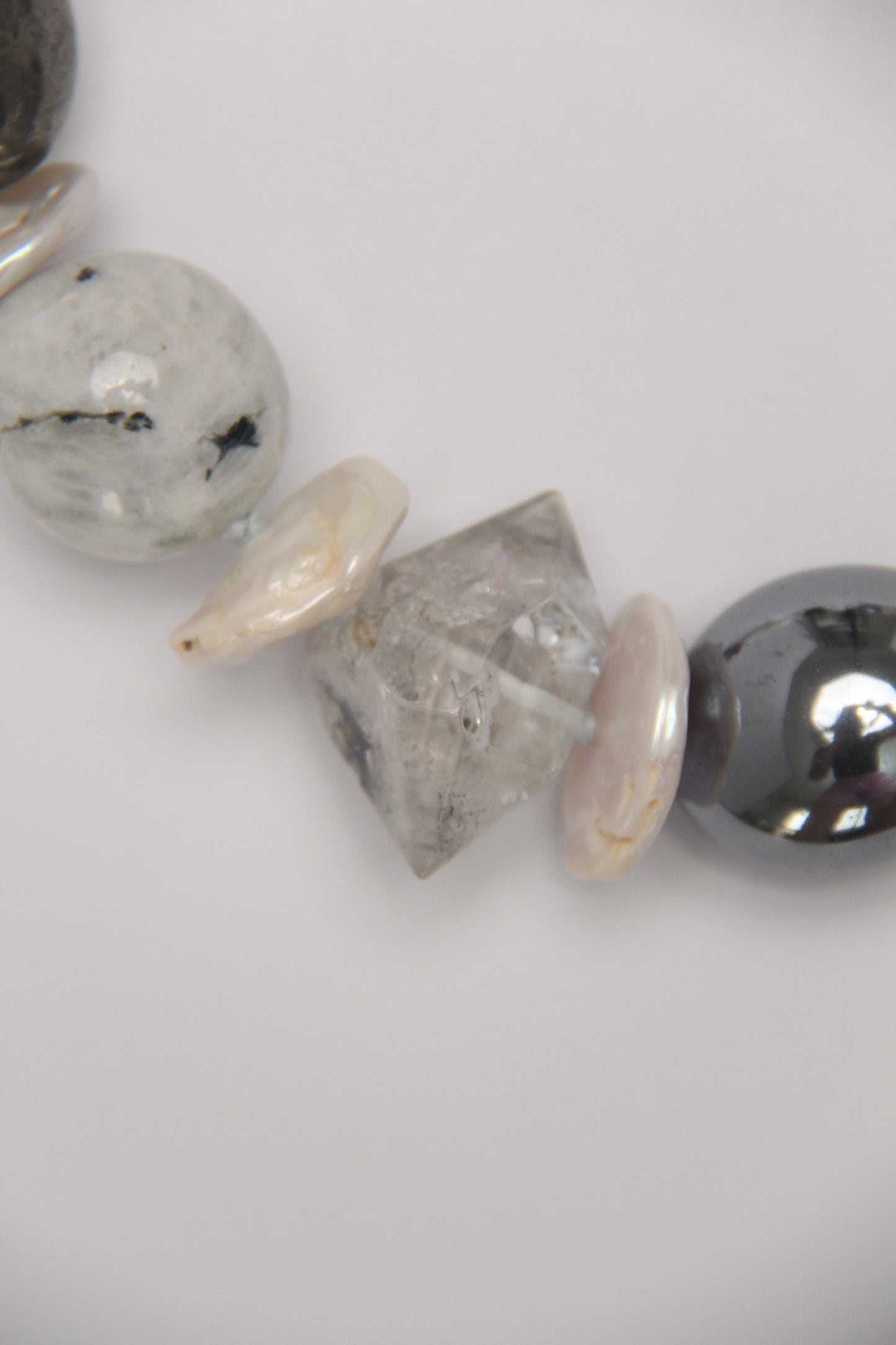 Necklace: herkimer diamond, kiwi stone, obsidian, quartz, moonstone, titanium magnet