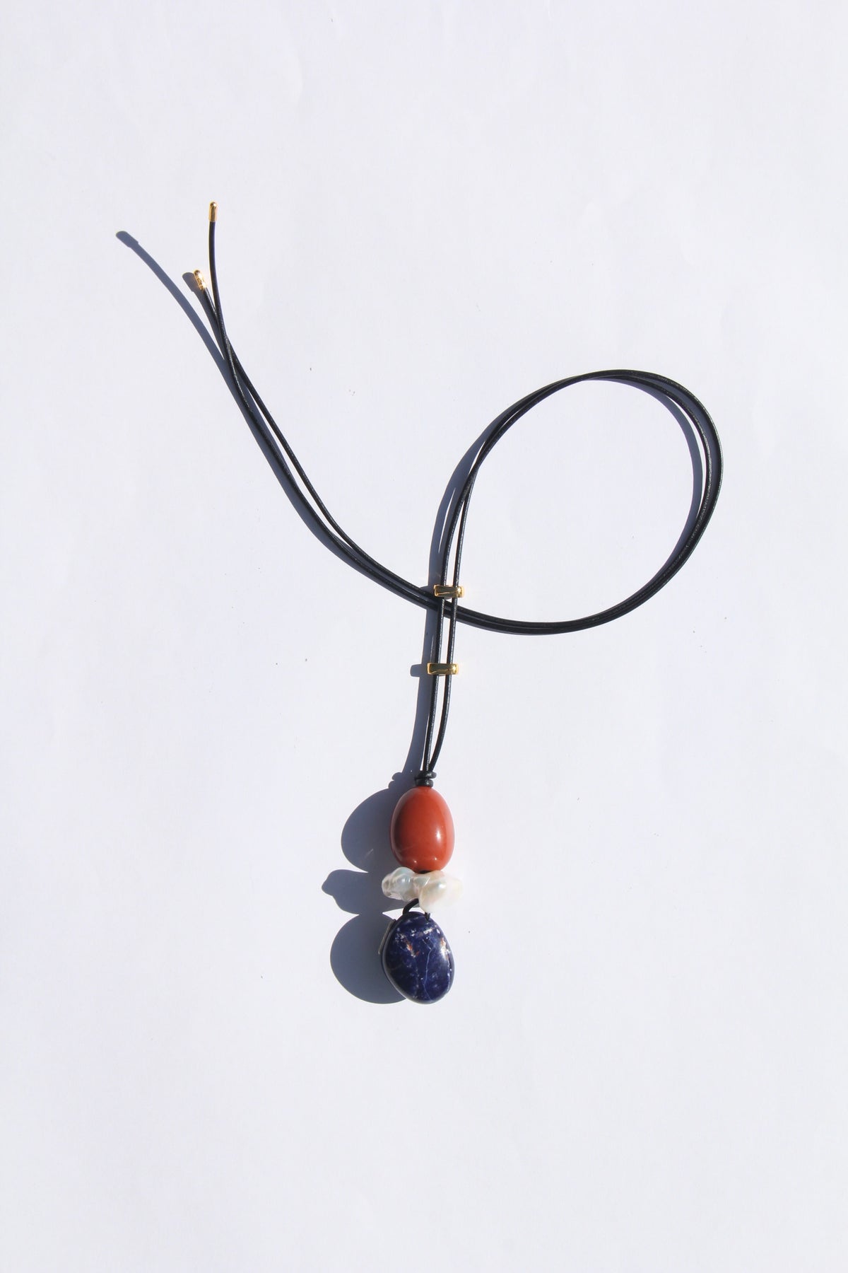 Necklace: red jasper stone, pearl, blue vein stone