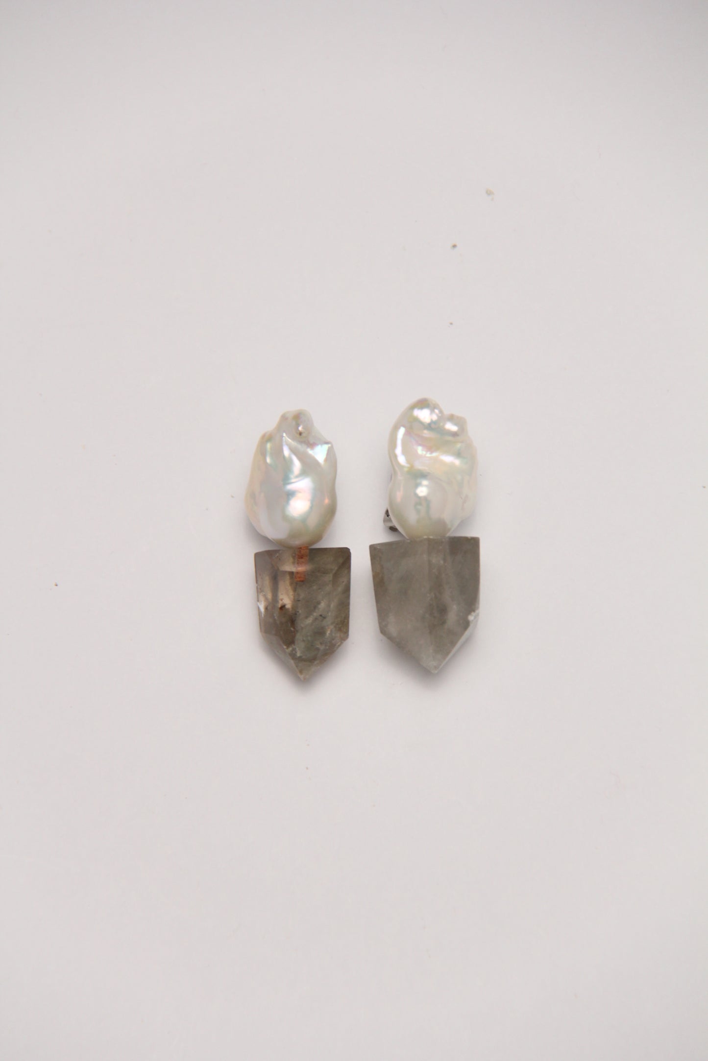 Earrings: pearls, phantom quartz