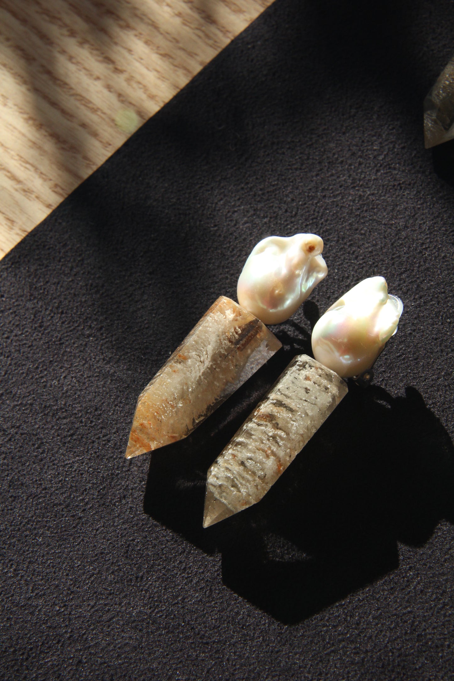 Earrings: pearls, phantom quartz