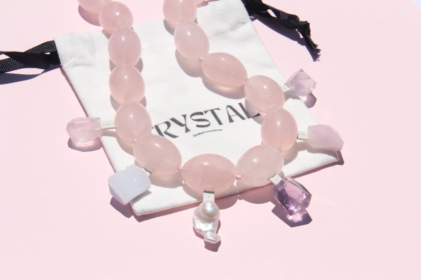Charms: rose quartz, blue lace agate, pearl, amethyst