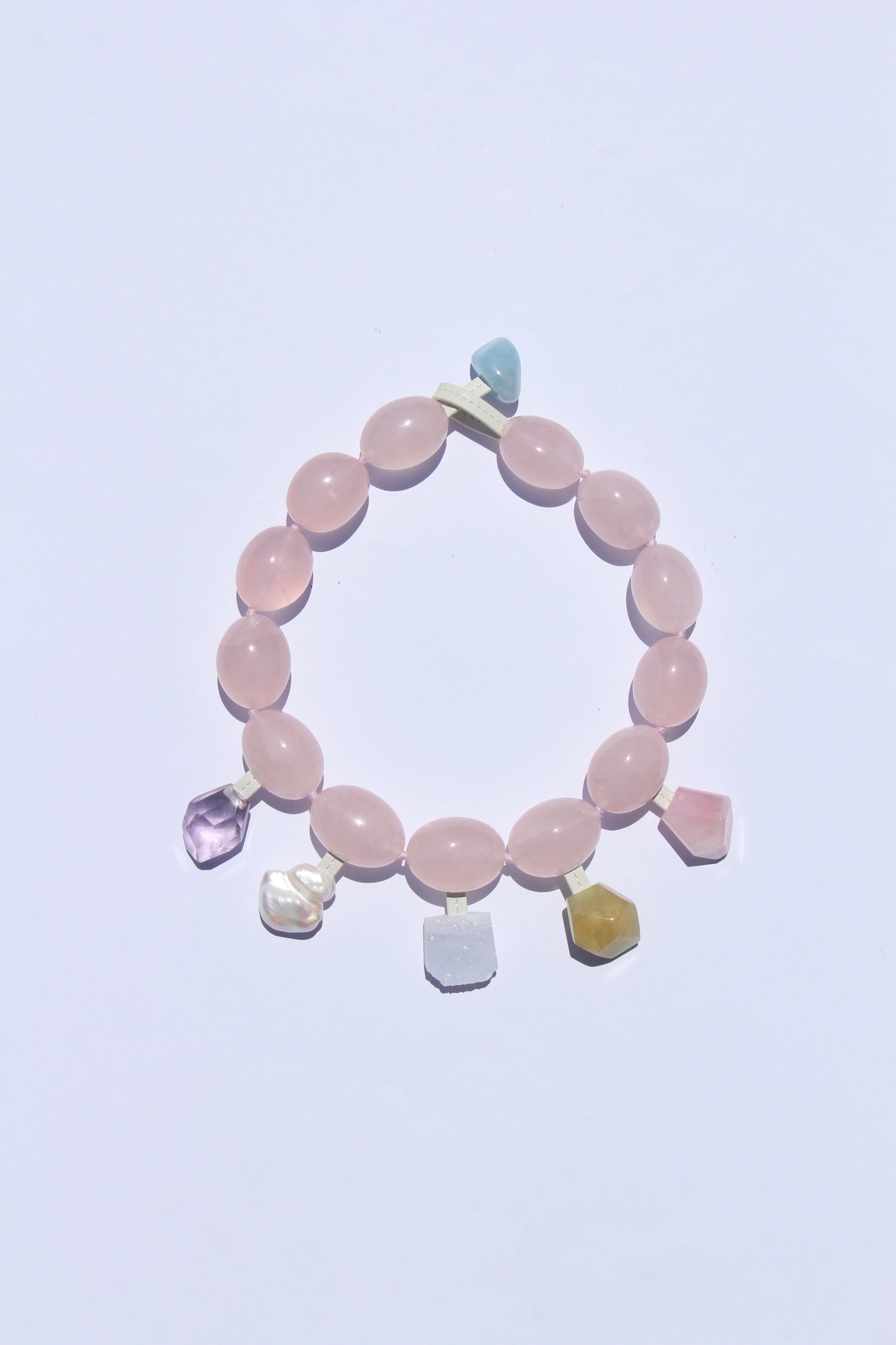 Charms: rose quartz, amethyst, morganite, pearl, blue lace agate