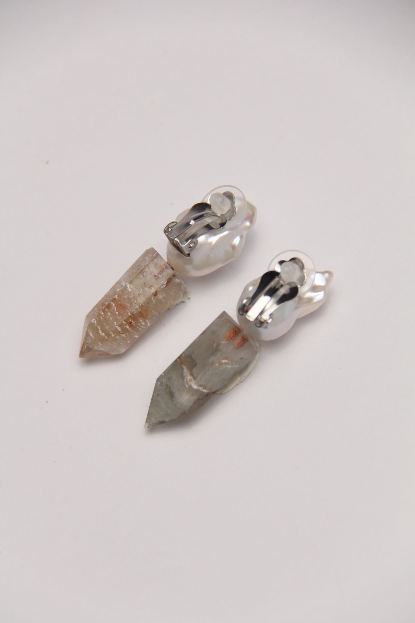 Earrings: pearls, phantom quartz