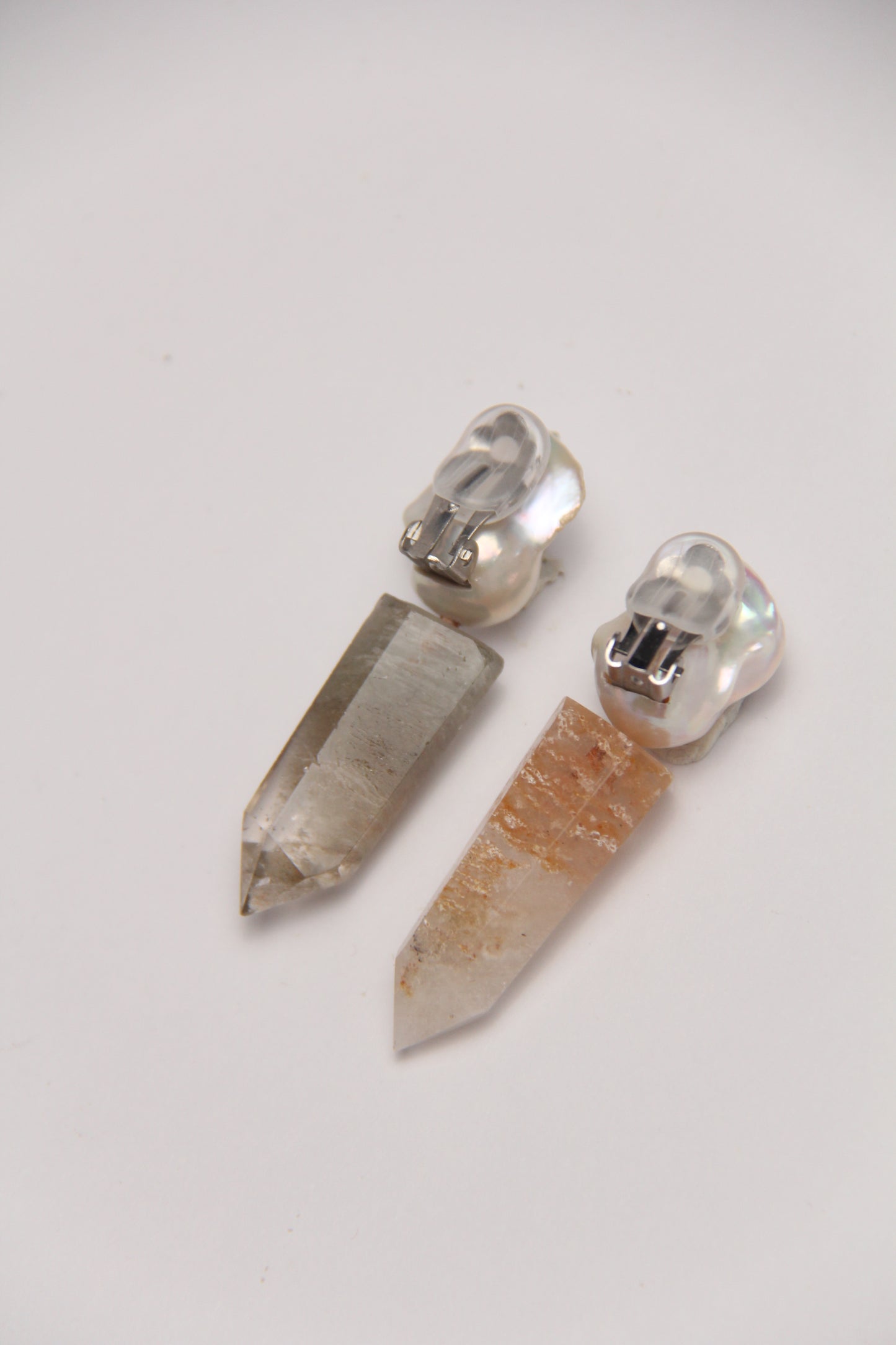 Earrings: pearls, phantom quartz