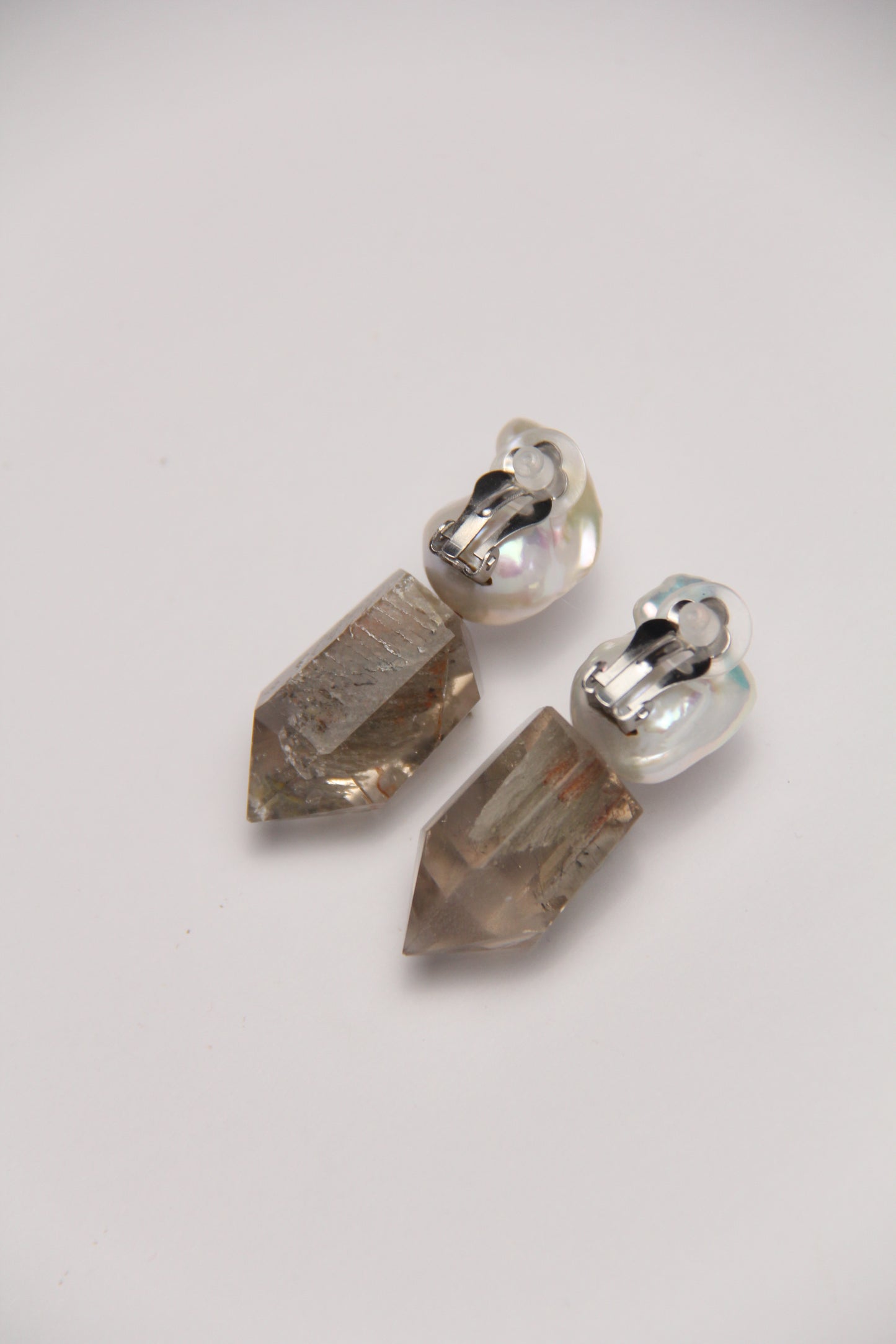 Earrings: pearls, phantom quartz