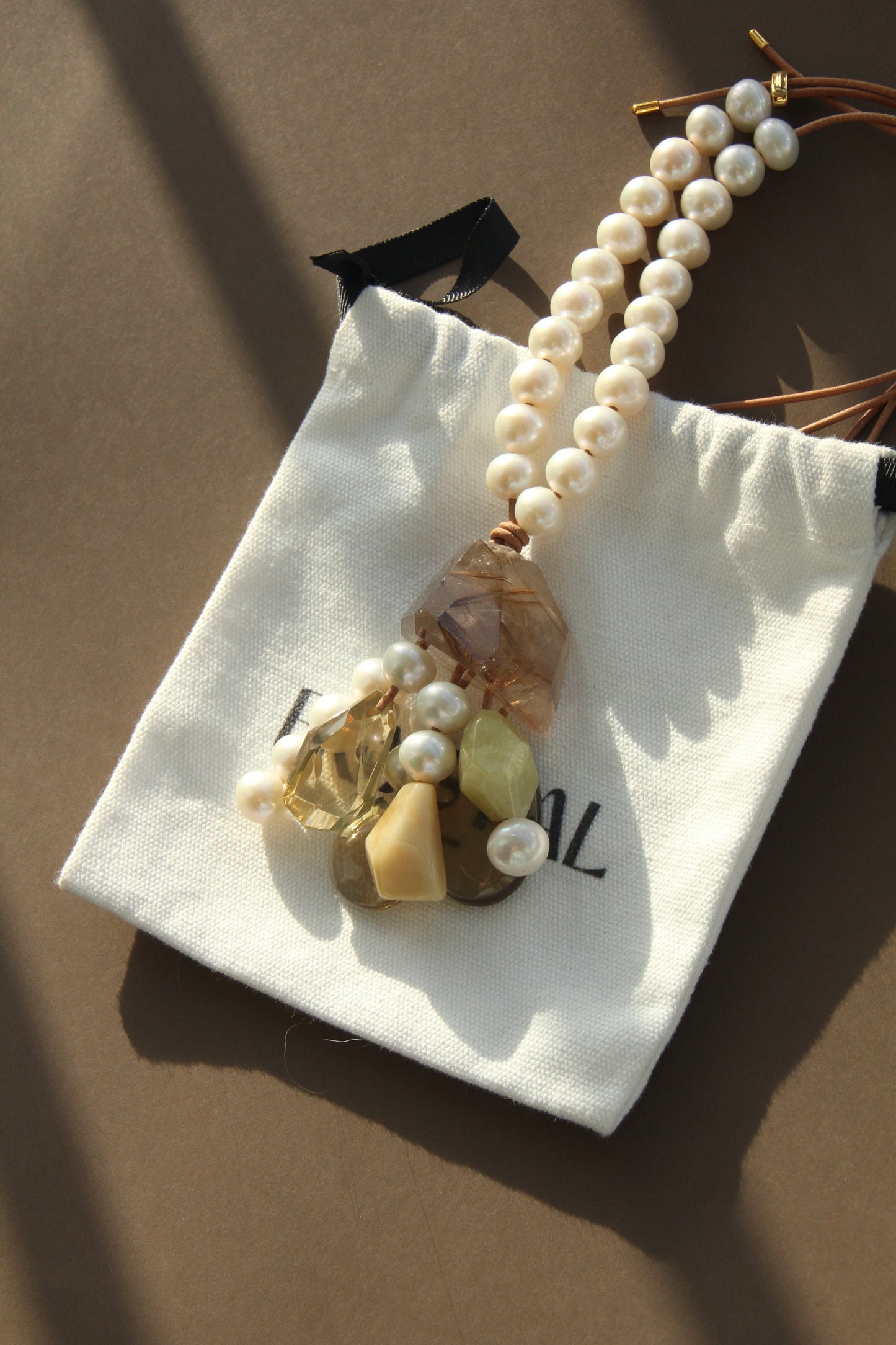 Pendant: golden rutilated quartz, pearls, morganite, citrine