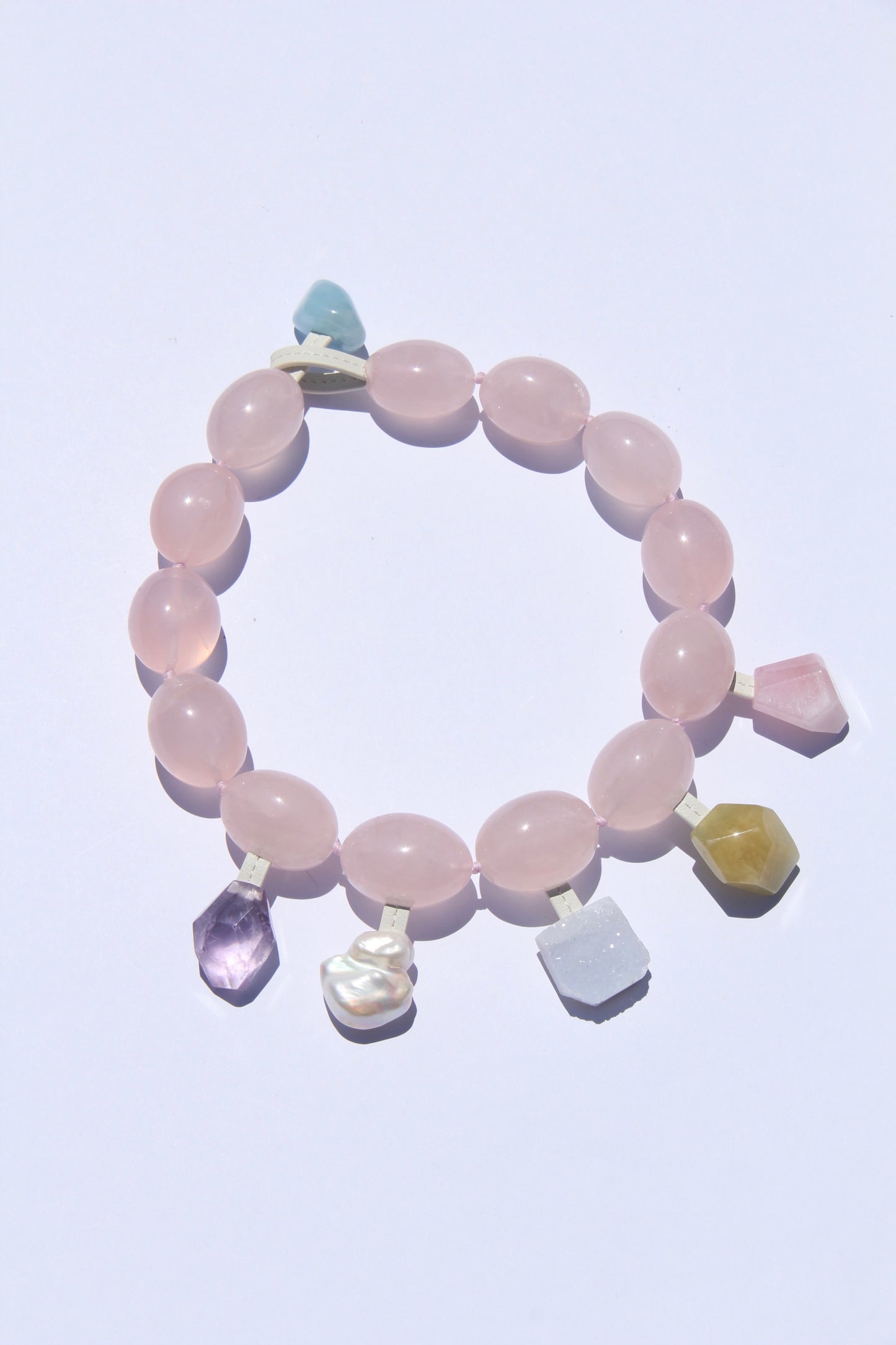 Charms: rose quartz, amethyst, morganite, pearl, blue lace agate