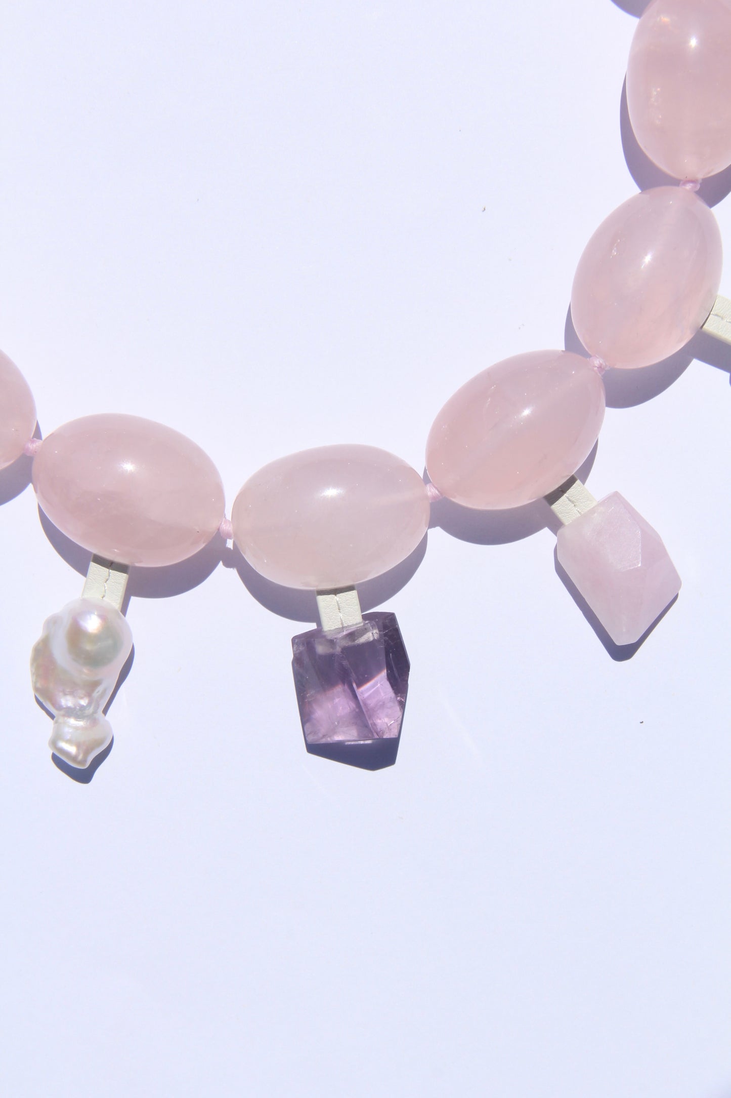 Charms: rose quartz, blue lace agate, pearl, amethyst