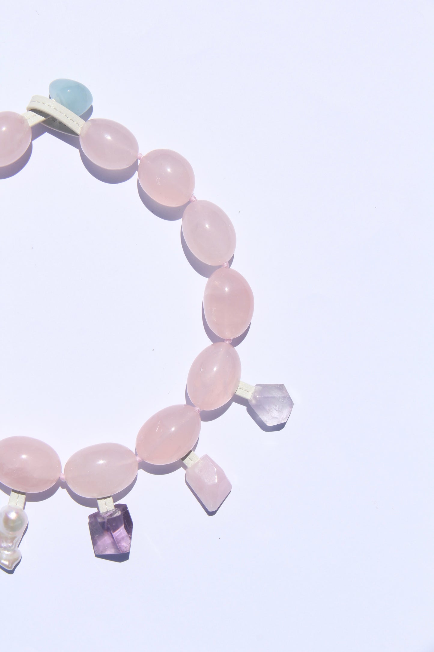 Charms: rose quartz, blue lace agate, pearl, amethyst