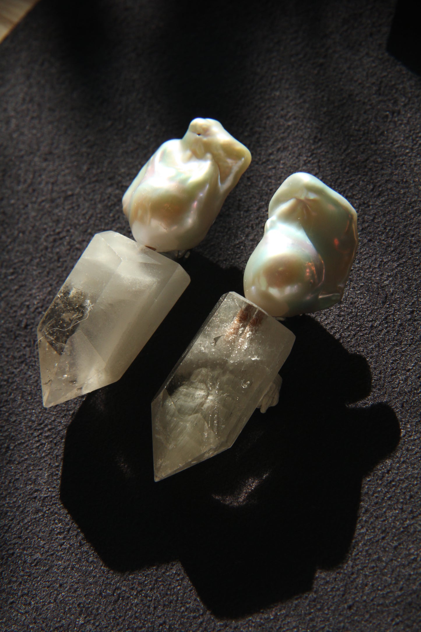 Earrings: pearls, phantom quartz