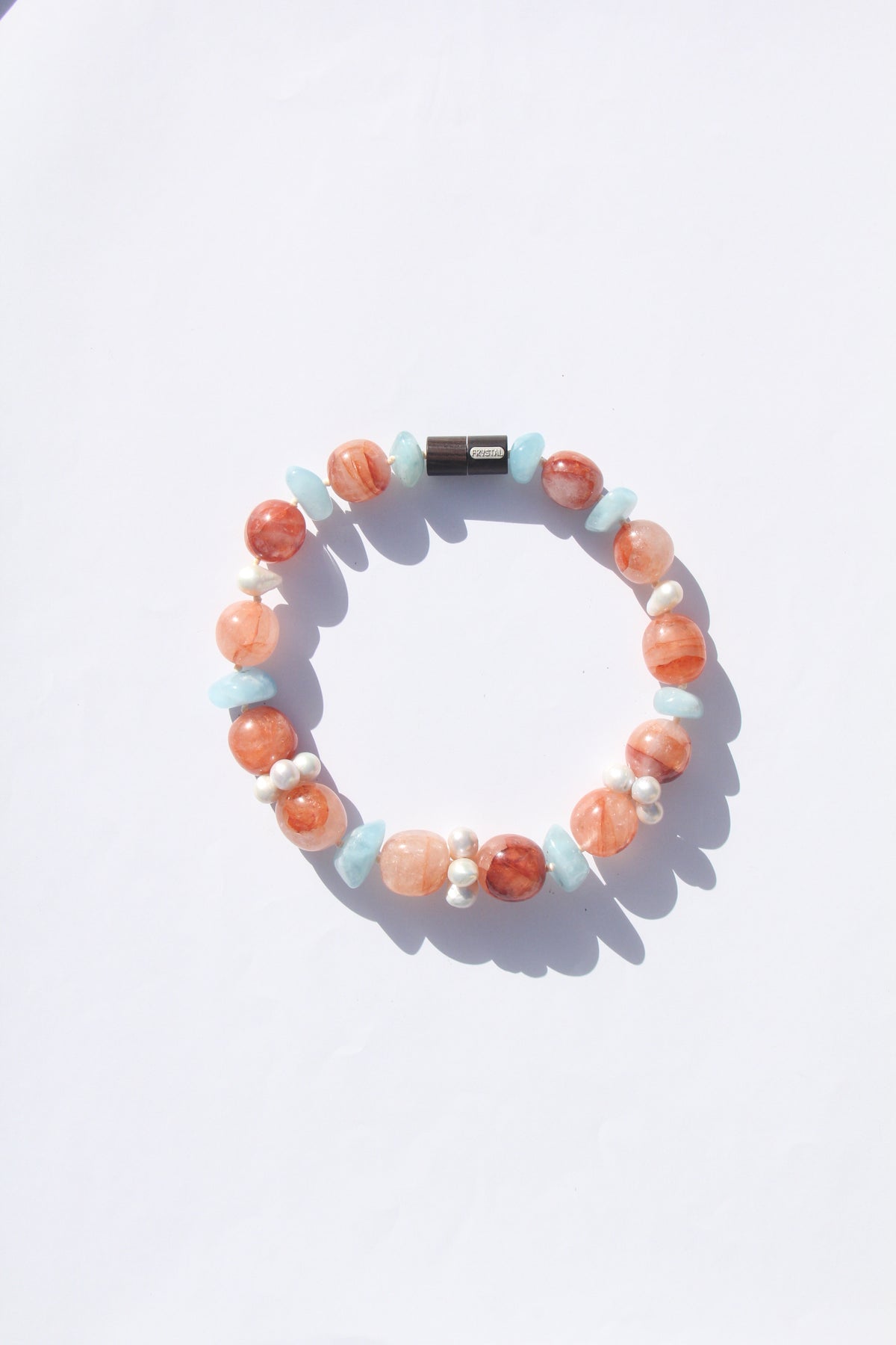 Necklace: morganite, quartz, pearls