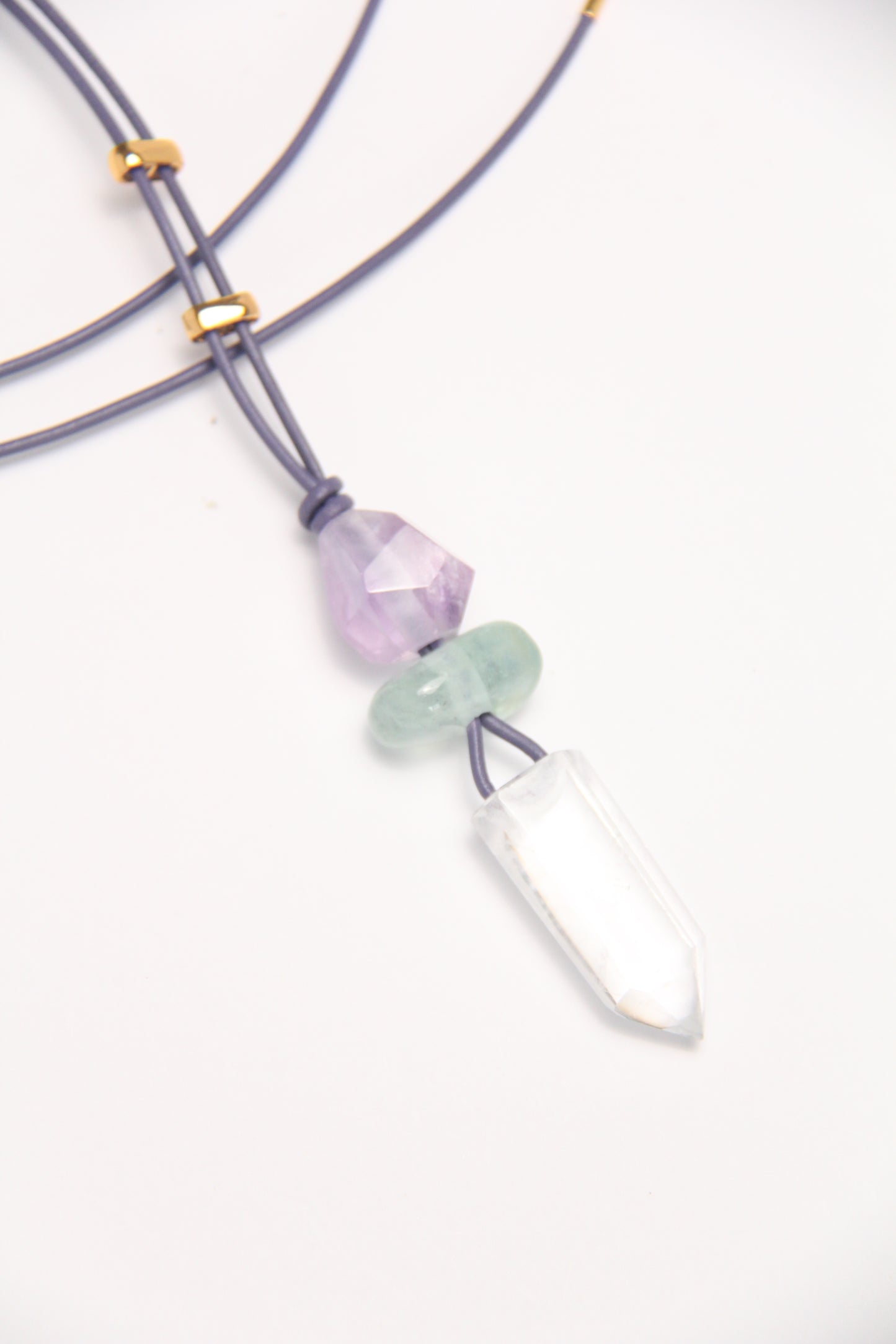 Pendant: amethyst, moganite, quartz, leather