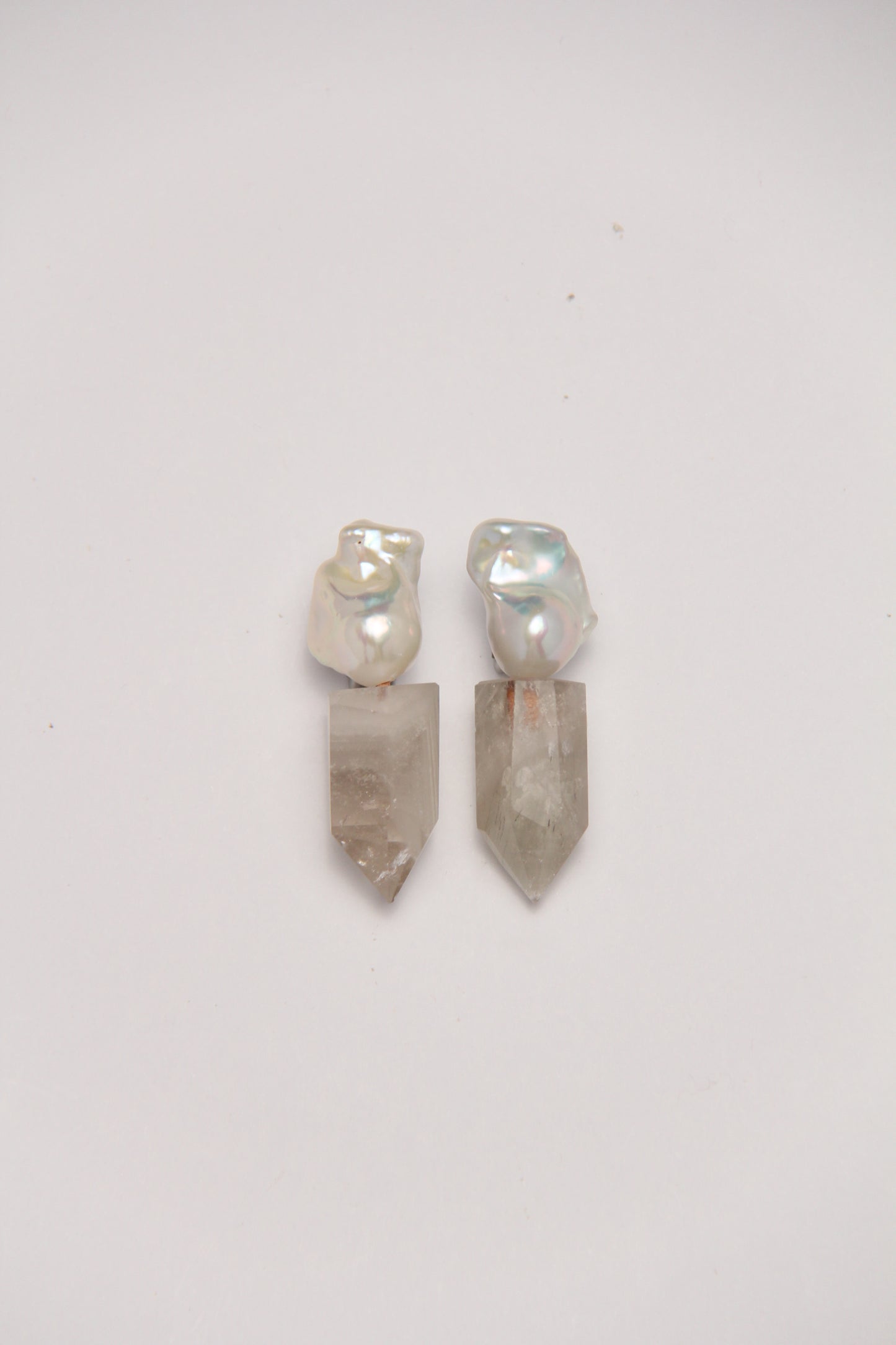 Earrings: pearls, phantom quartz