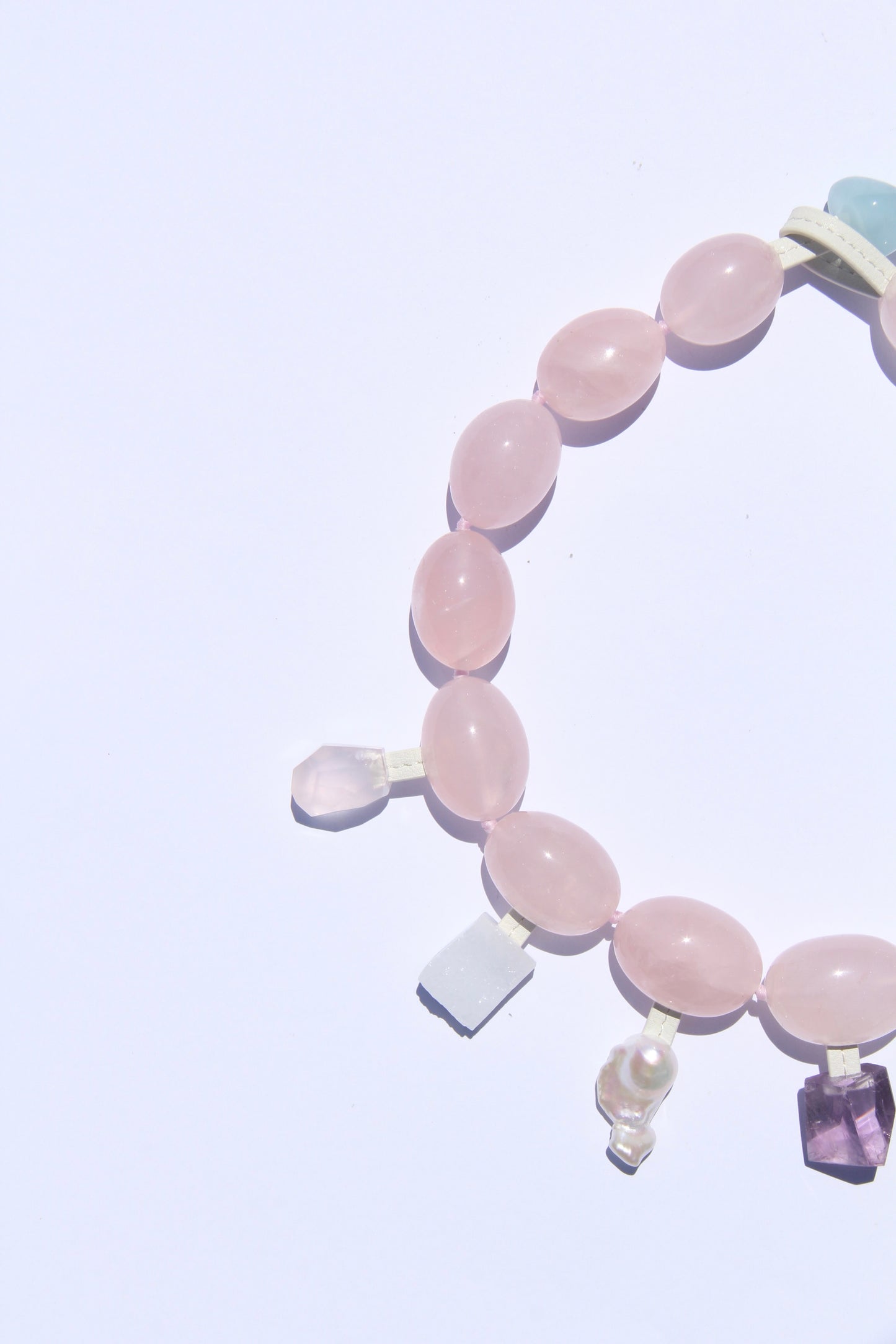 Charms: rose quartz, blue lace agate, pearl, amethyst