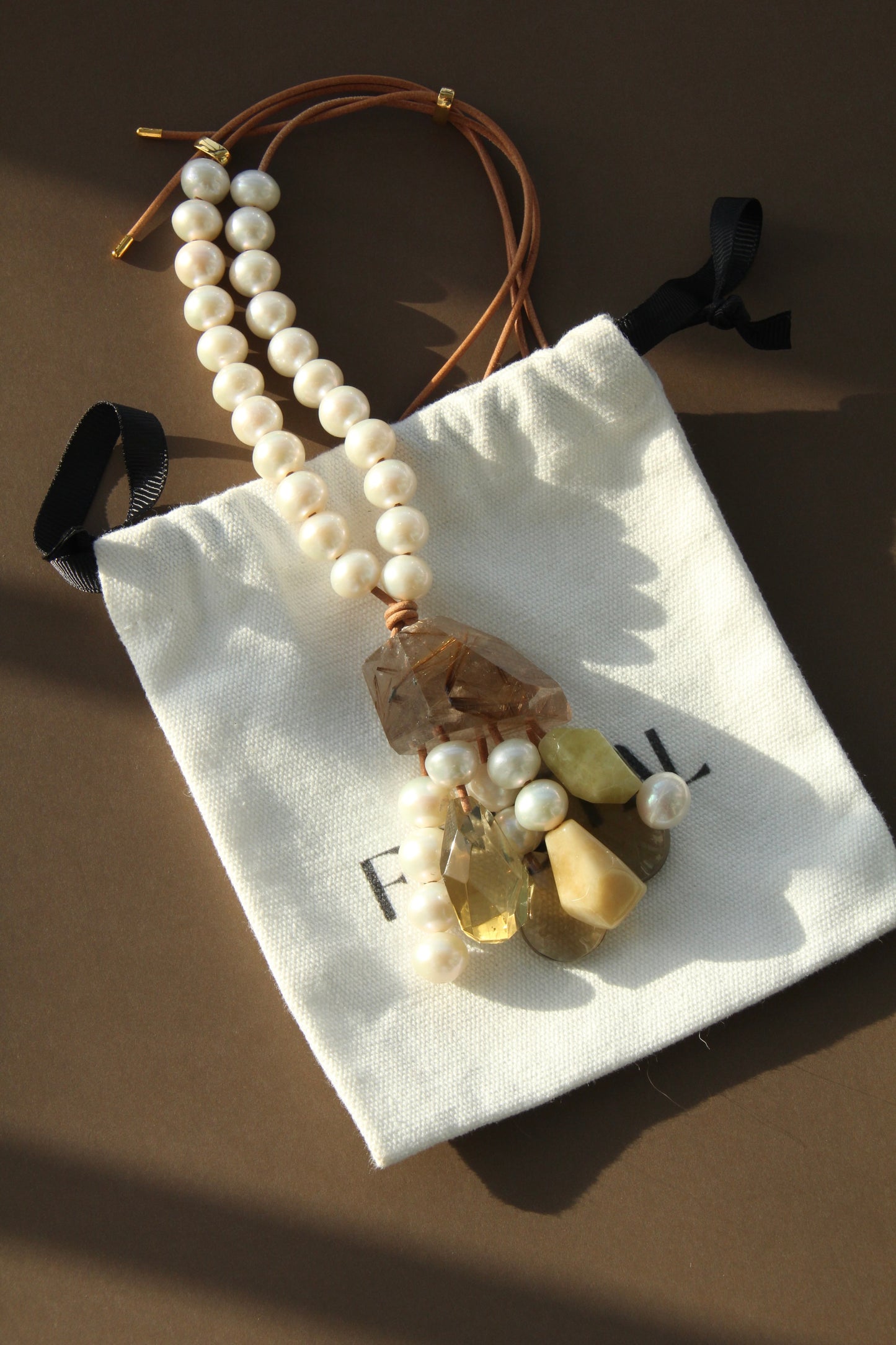 Pendant: golden rutilated quartz, pearls, morganite, citrine