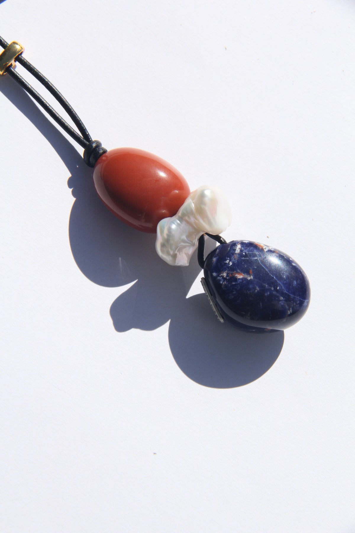 Necklace: red jasper stone, pearl, blue vein stone