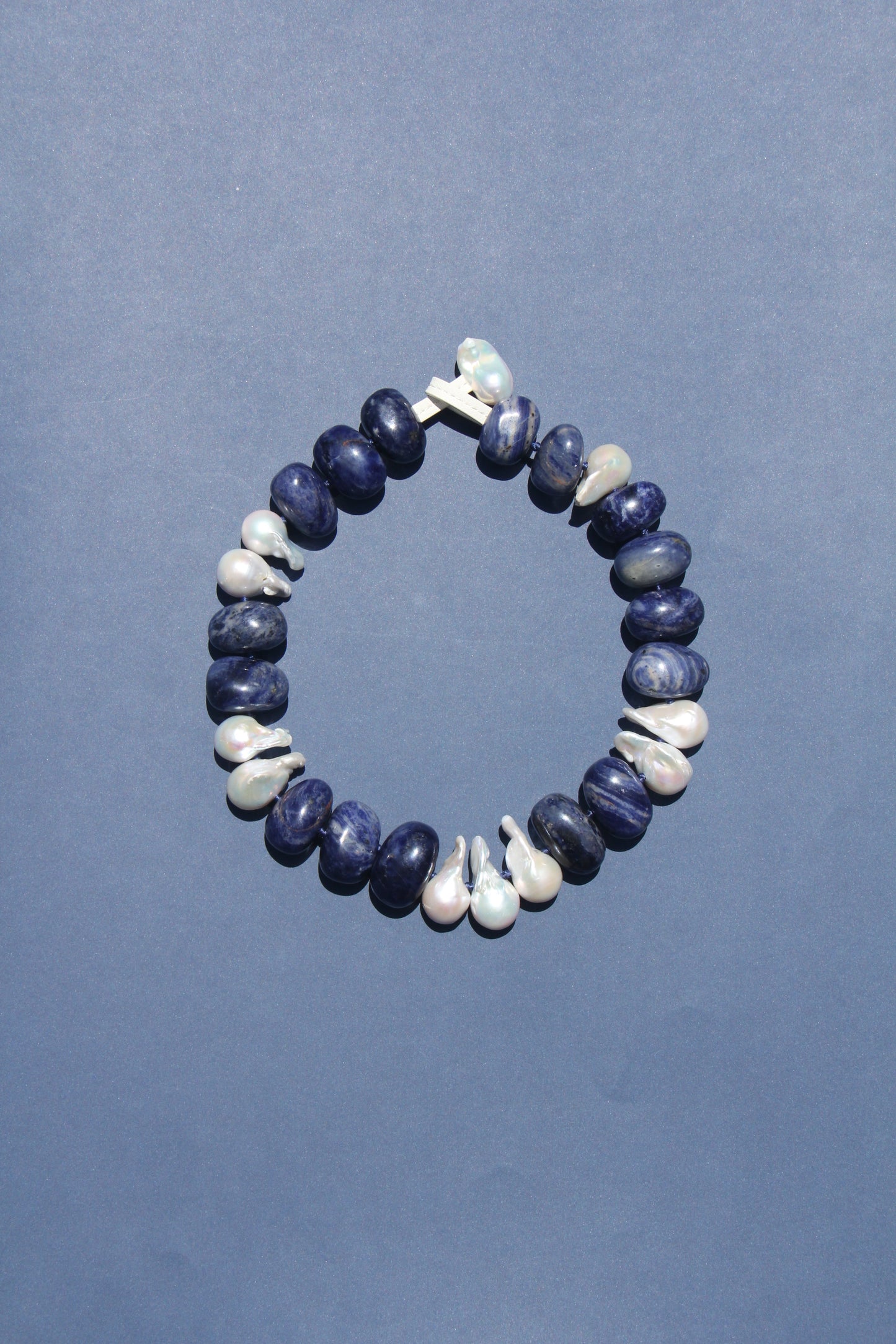 Necklace: pearls, blue vein stone