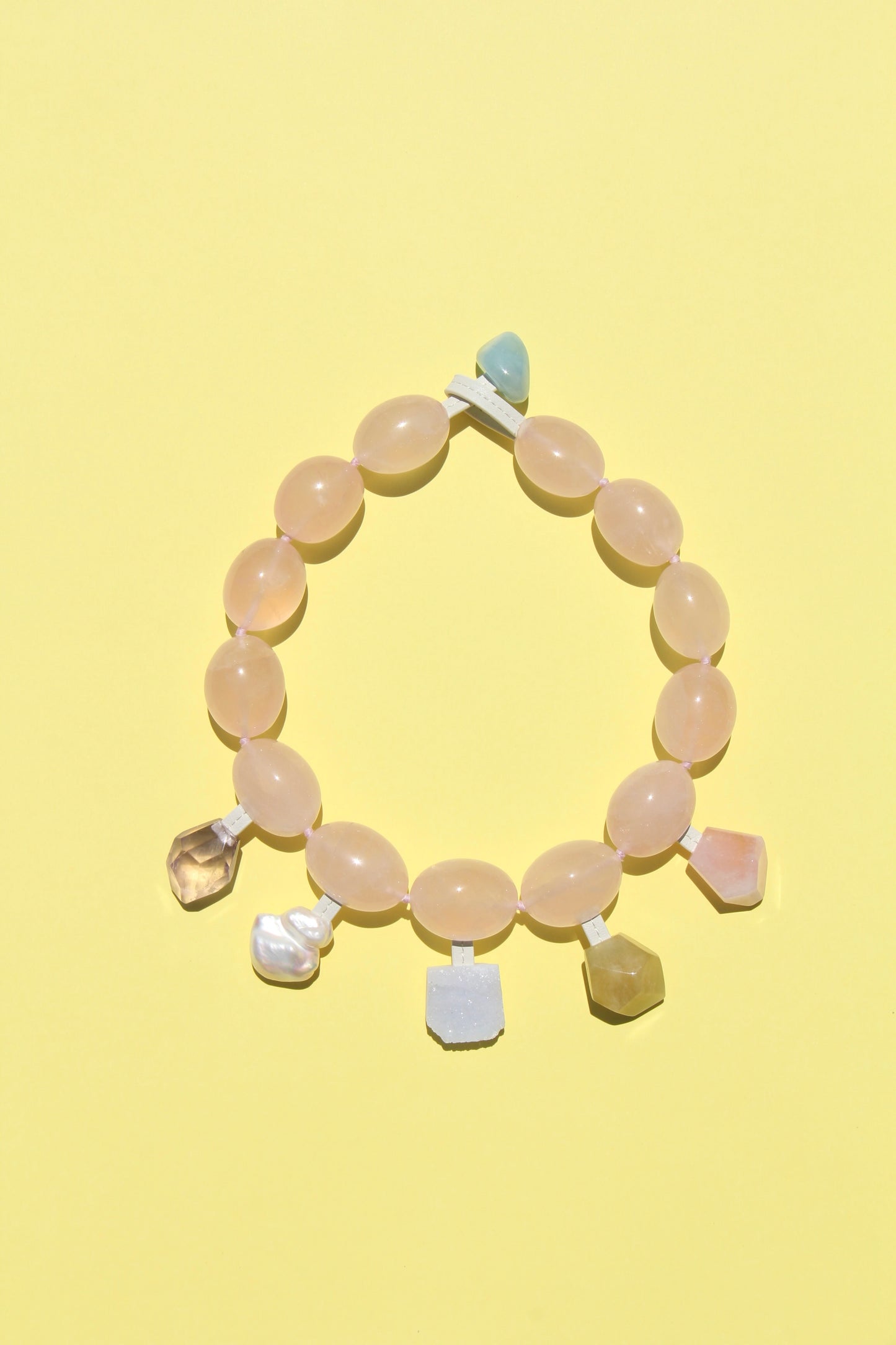 Charms: rose quartz, amethyst, morganite, pearl, blue lace agate