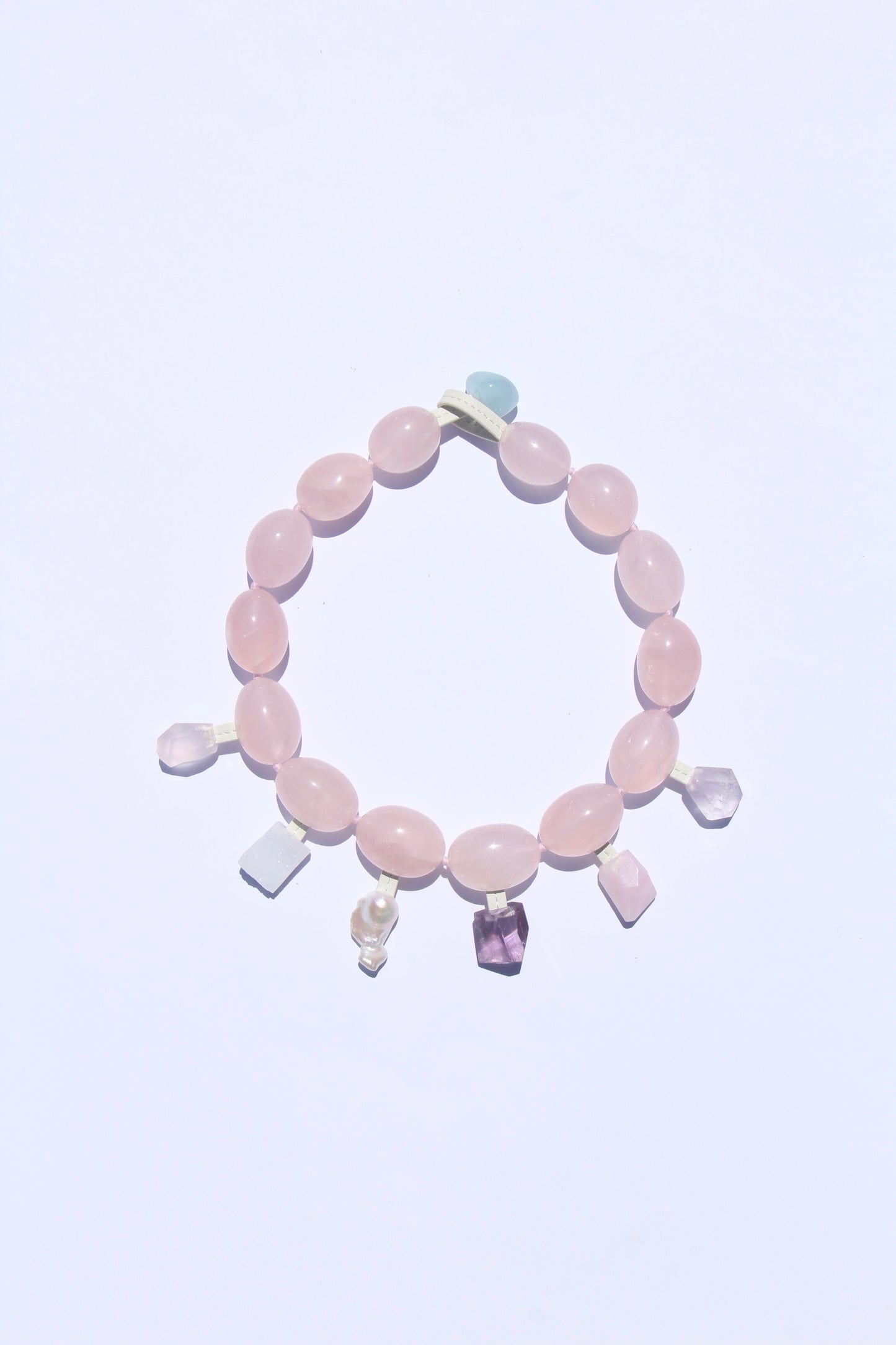 Charms: rose quartz, blue lace agate, pearl, amethyst