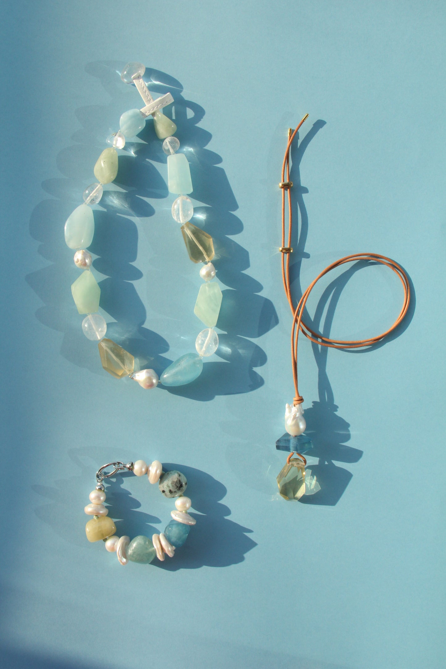Pendant: pearl, aquamarine, citrine, leather