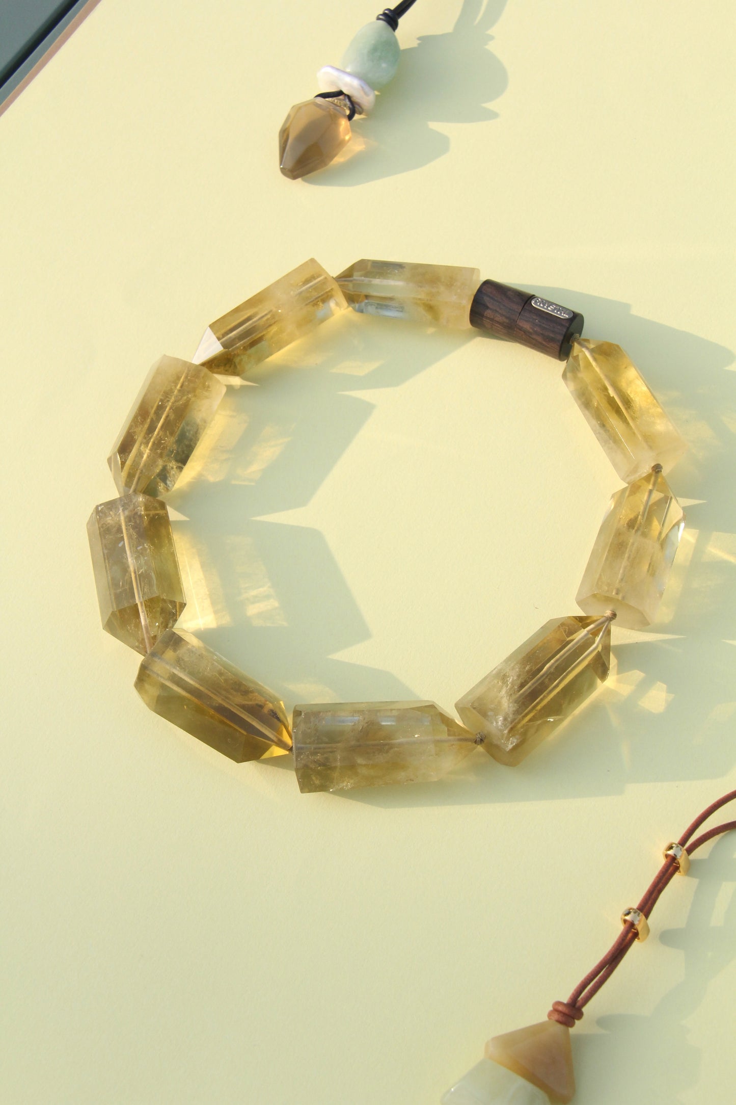 Necklace: citrine, ebony