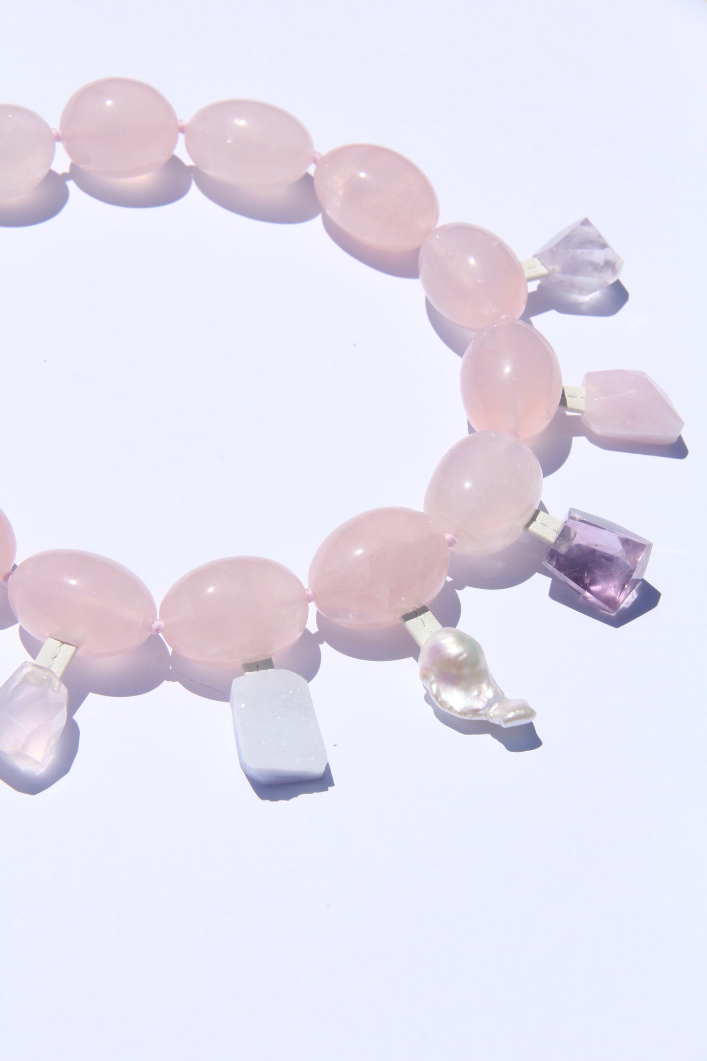 Charms: rose quartz, blue lace agate, pearl, amethyst