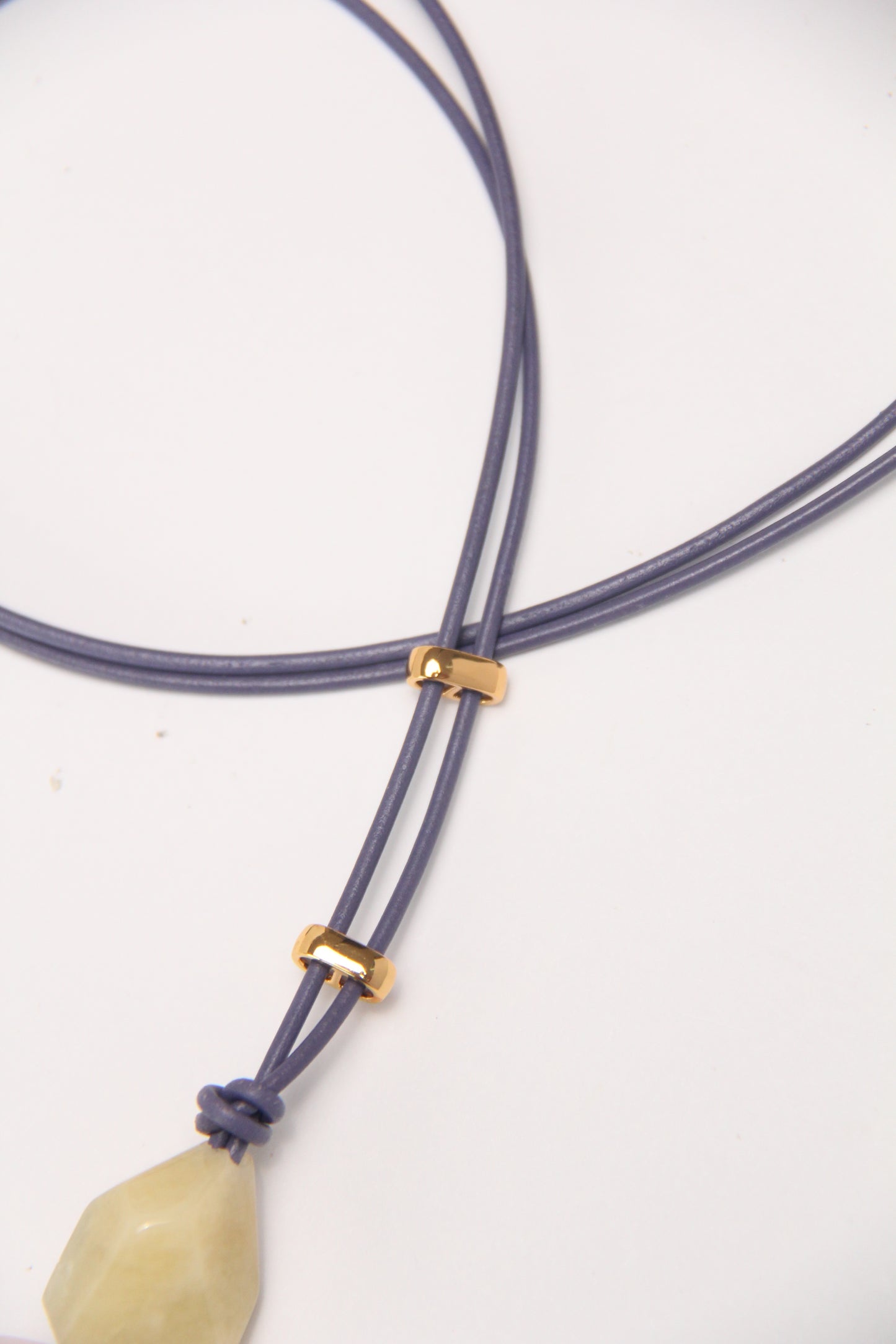 Pendant: morganite, amethyst, leather