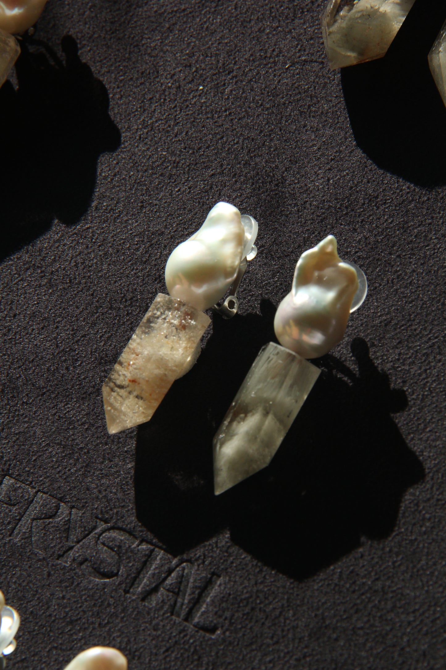 Earrings: pearls, phantom quartz
