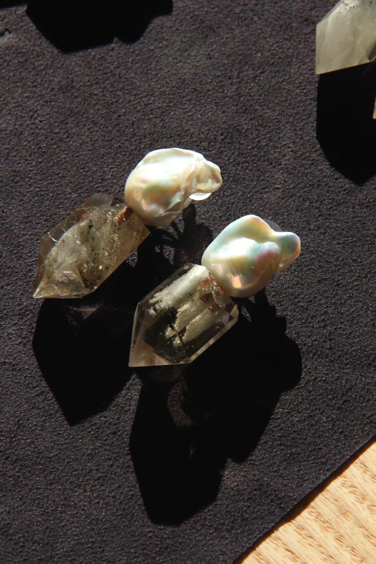 Earrings: pearls, phantom quartz