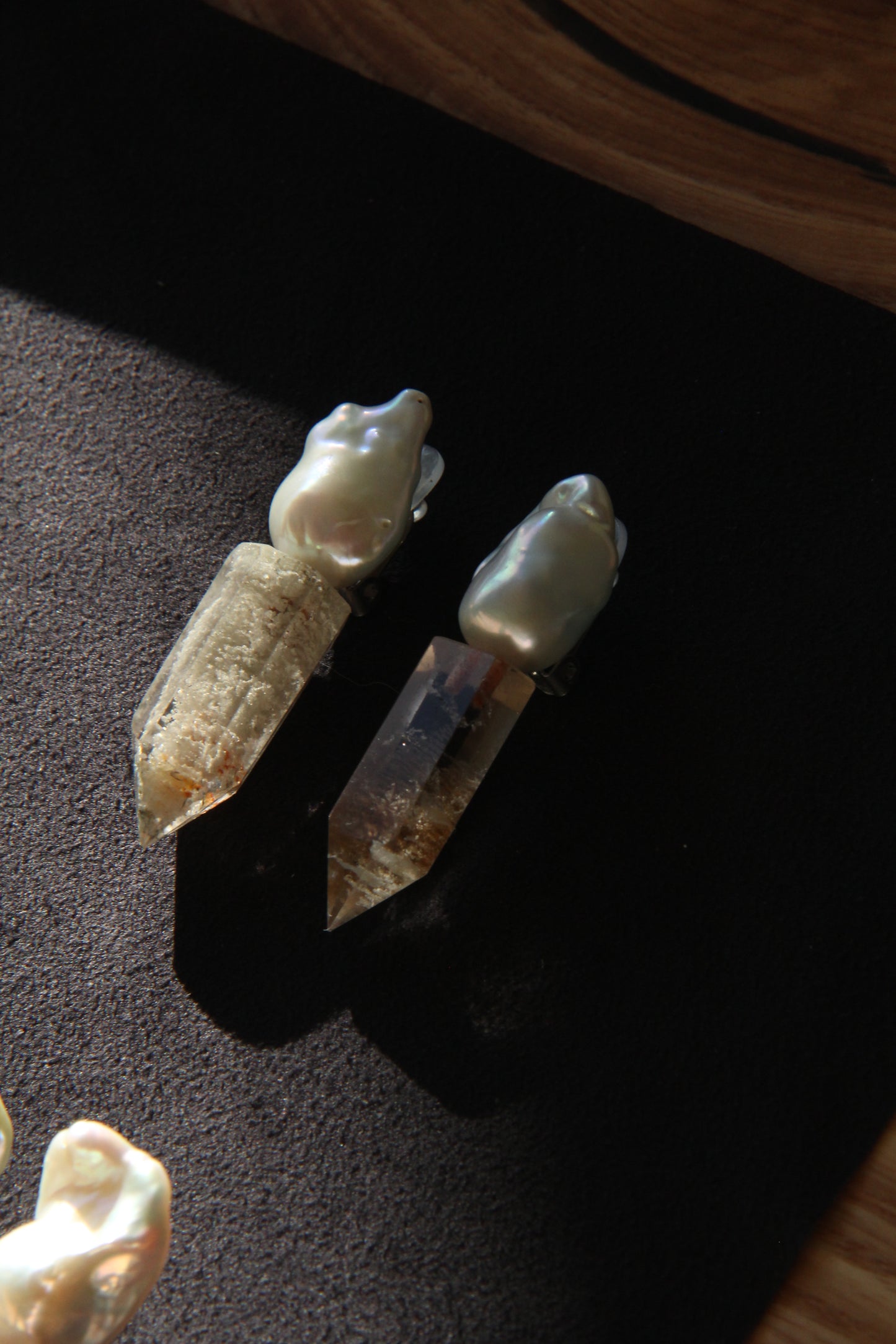 Earrings: pearls, phantom quartz