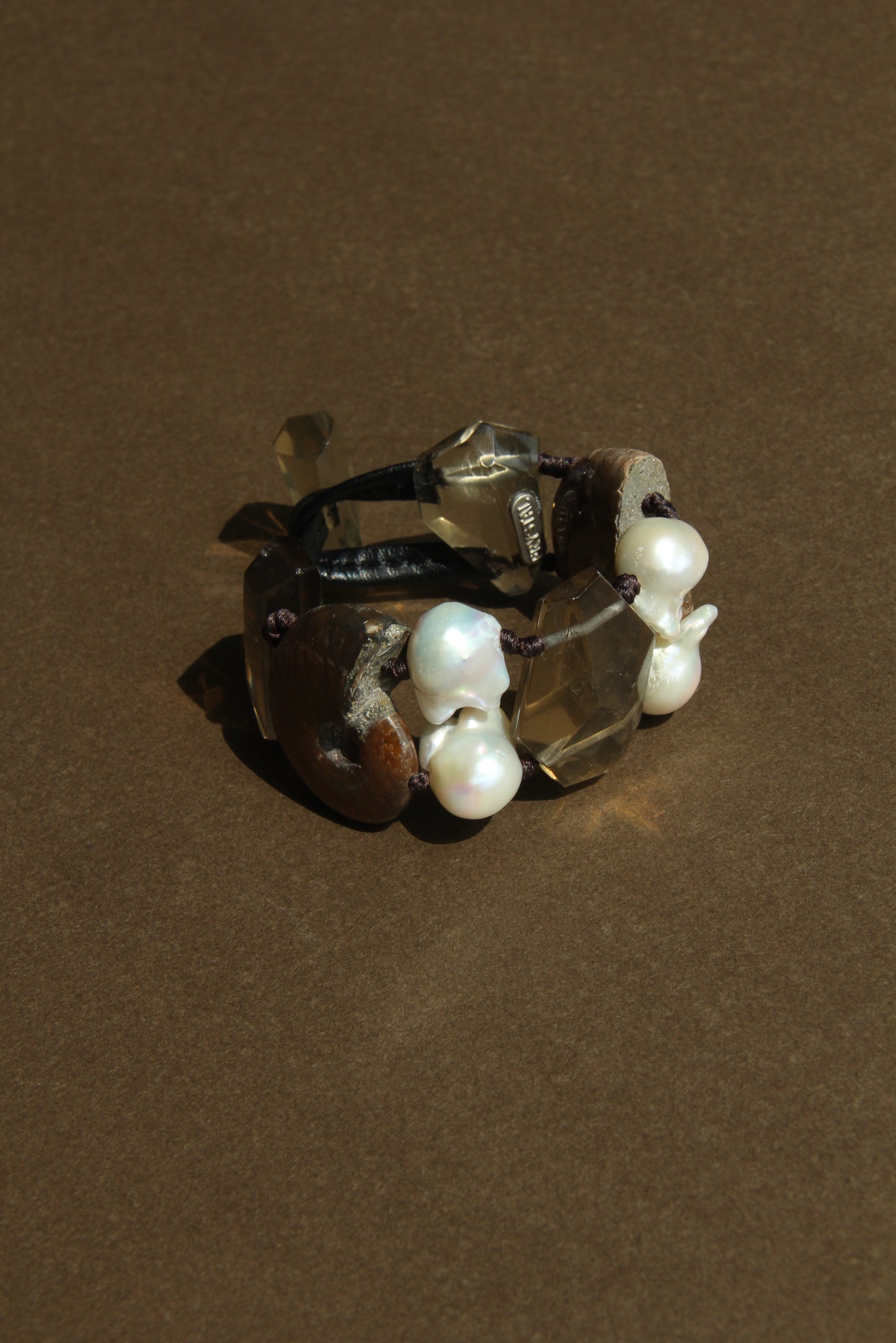 Bracelet: ammonite fossils, smoky quartz, pearls