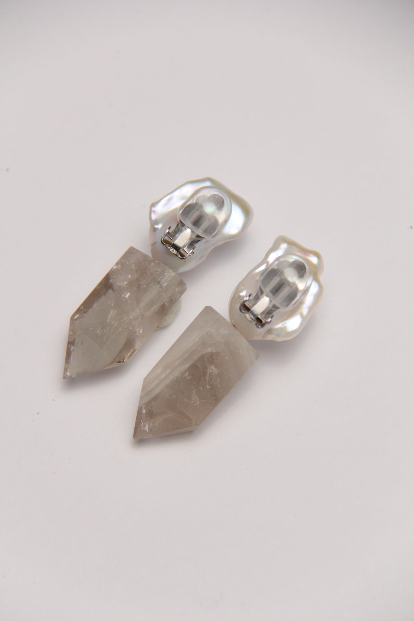 Earrings: pearls, phantom quartz