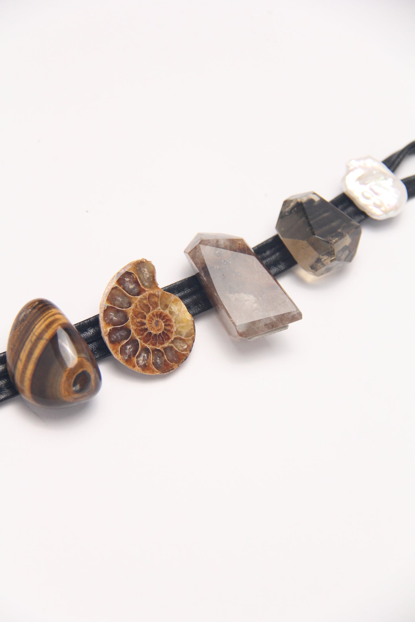 Bracelet: ammonite fossil, tiger's eye, rutilated quartz, citrine, pearls