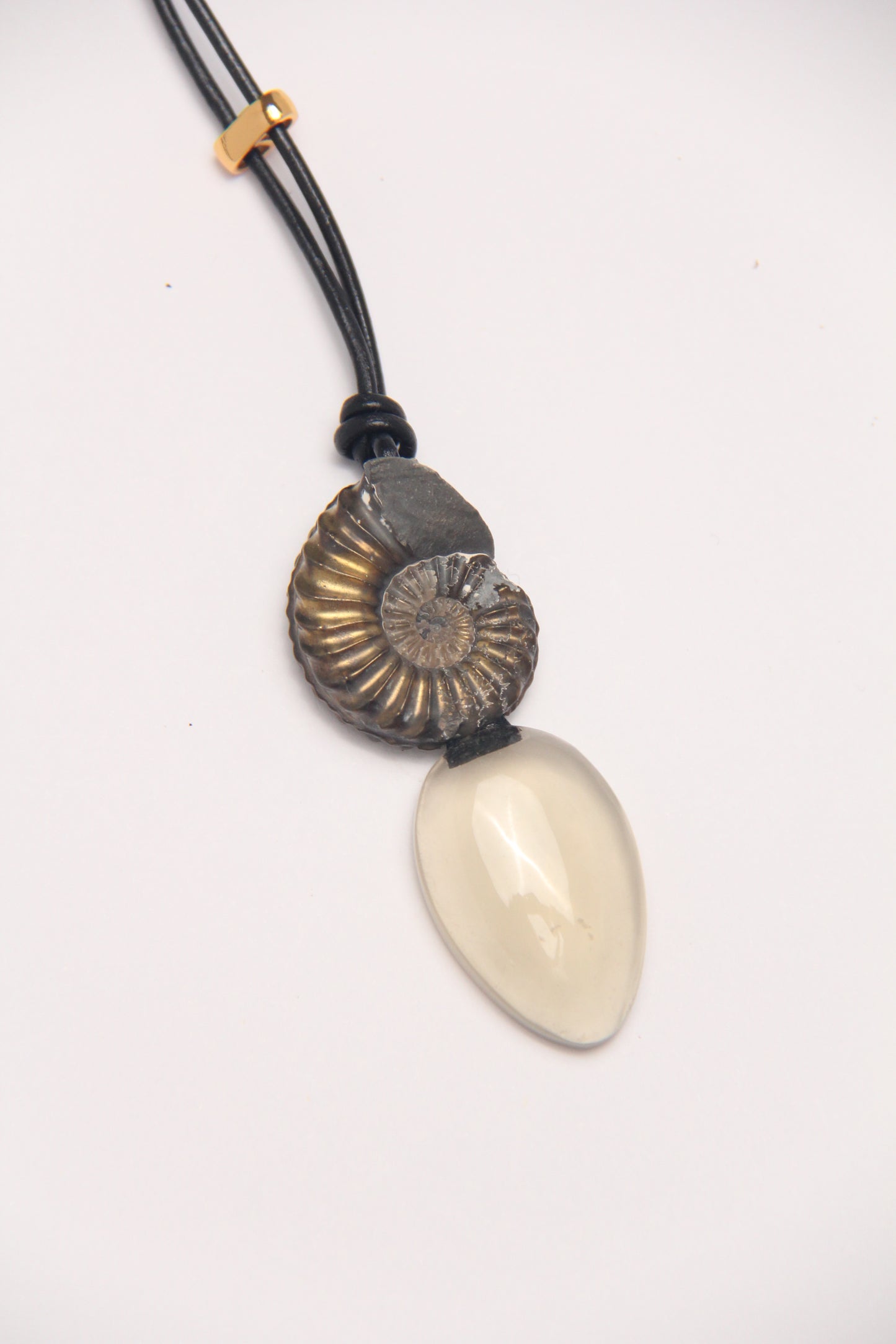 Pendant: ammonite fossil, citrine, leather