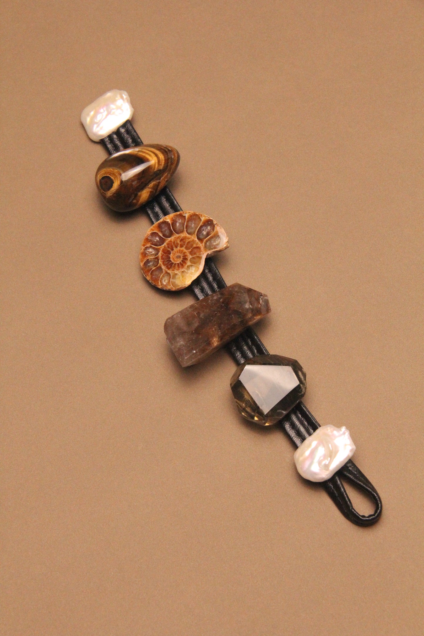 Bracelet: ammonite fossil, tiger's eye, rutilated quartz, citrine, pearls