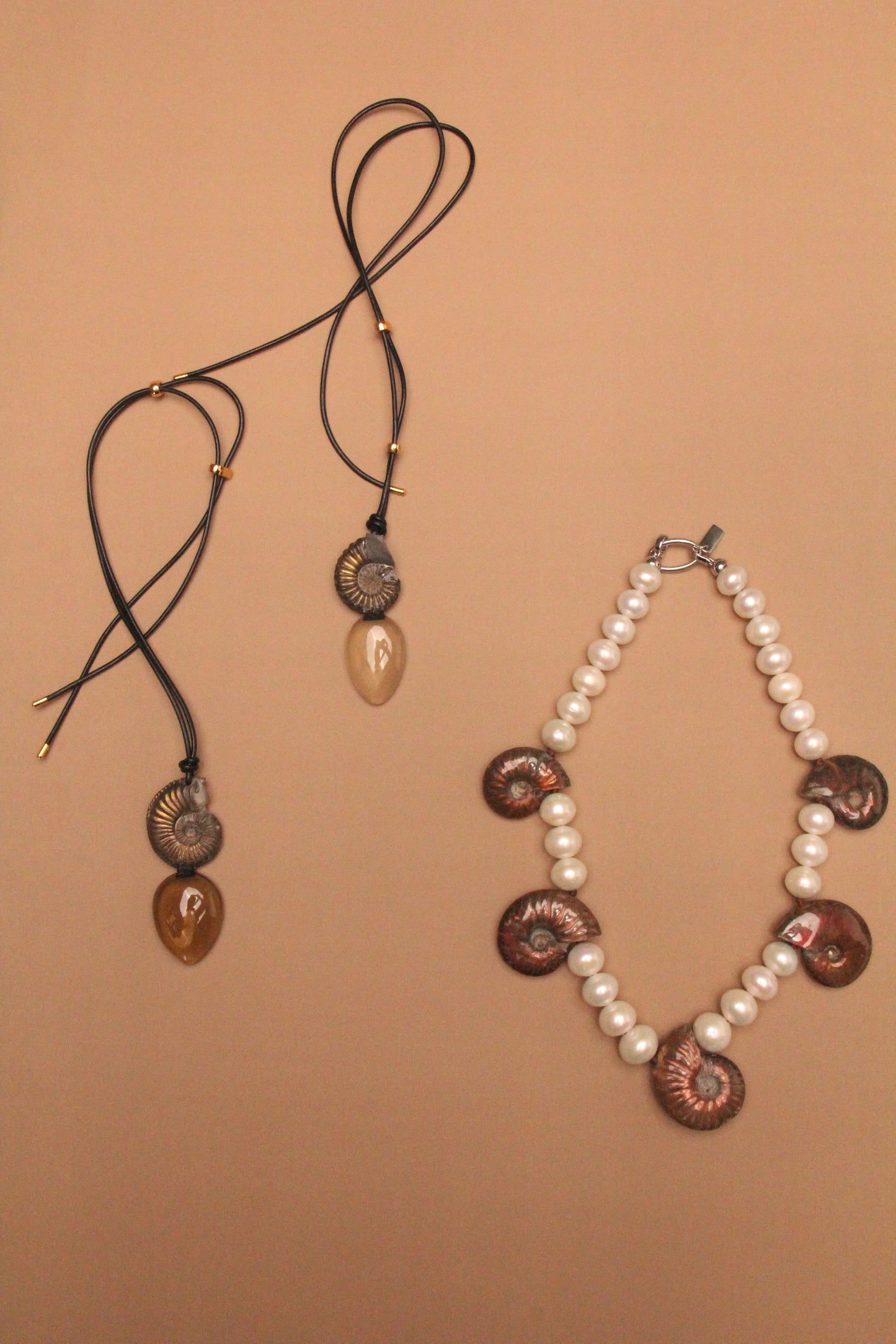Pendant: ammonite fossil, citrine, leather