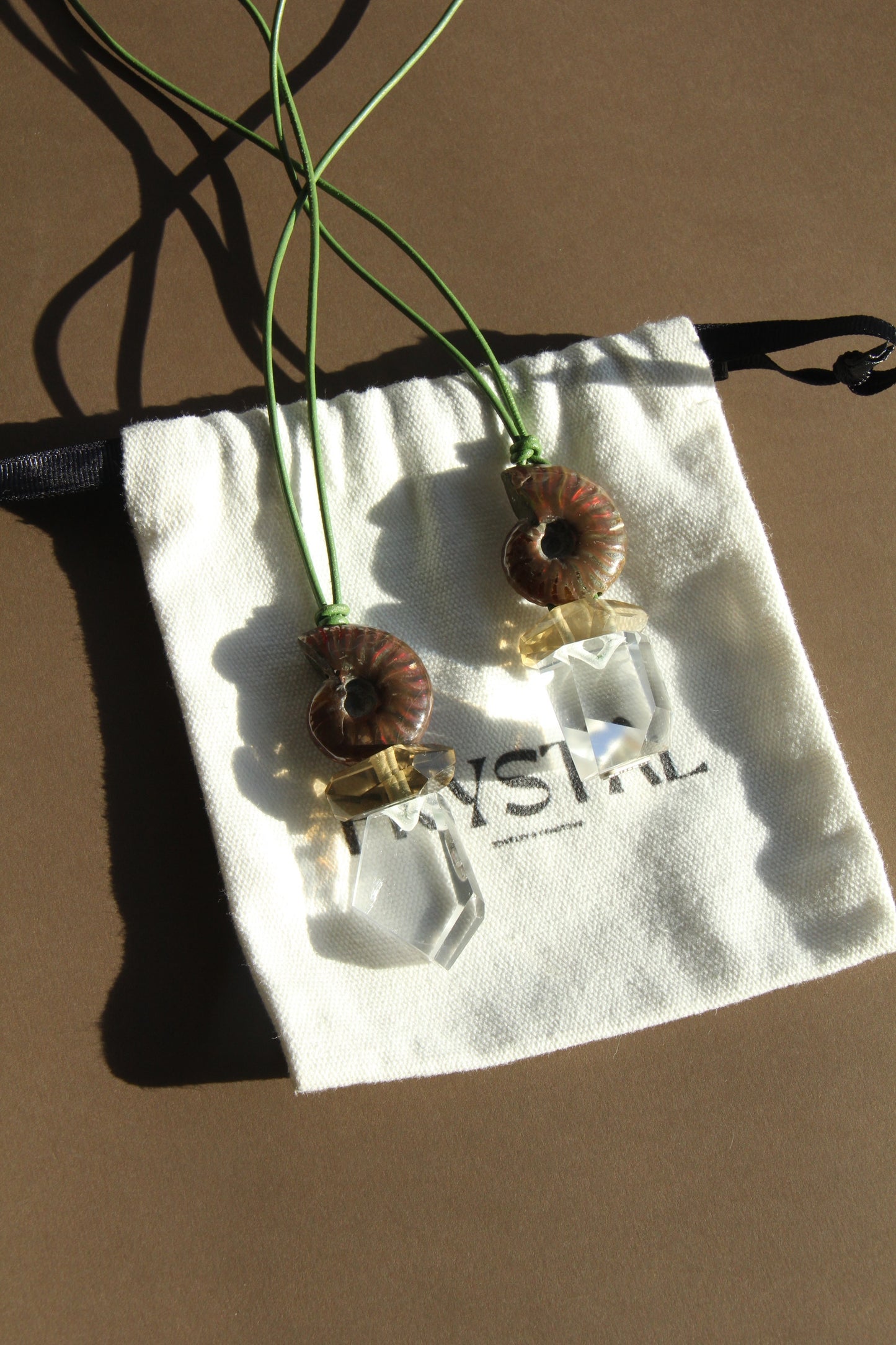 Pendant: ammonite, citrine, quartz